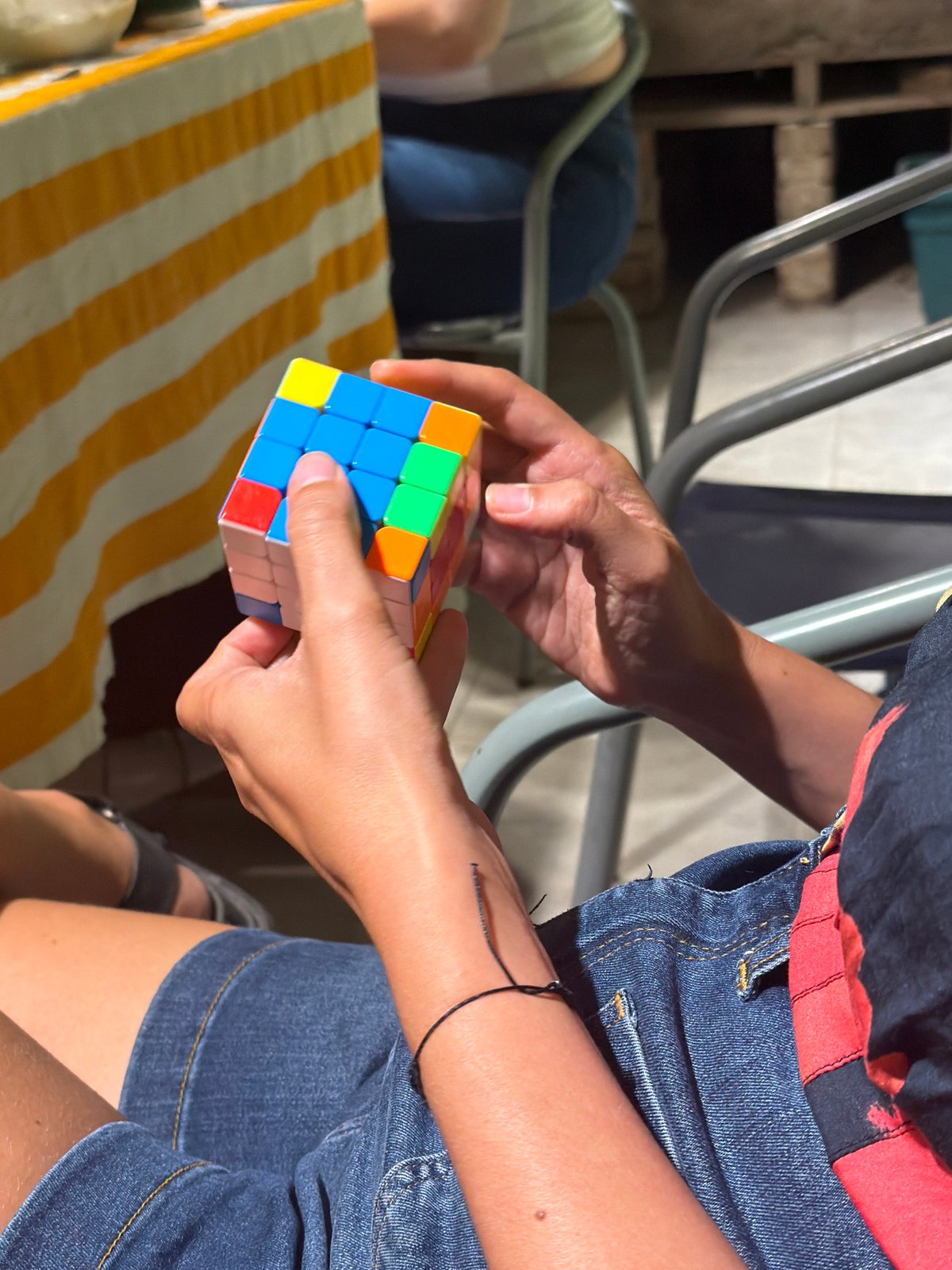 Buenos Aires morning scenes: Rubik's Cube solving and pastry dining