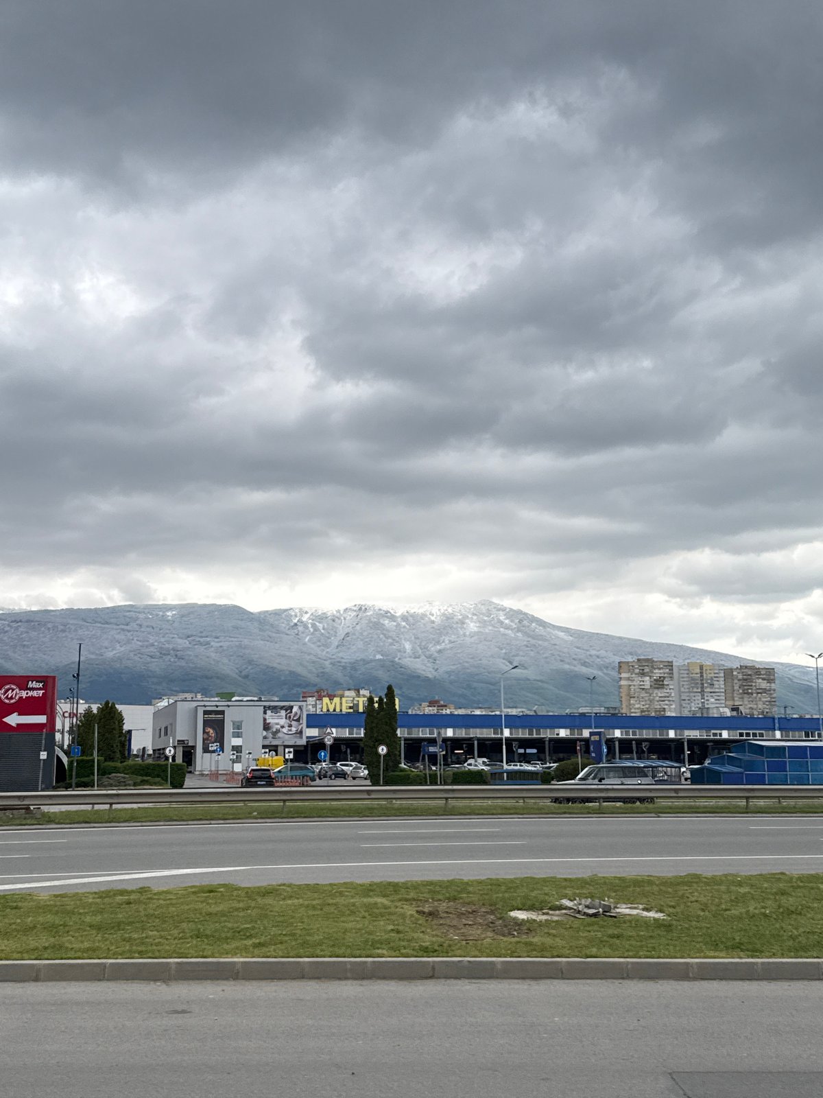 Urban landscape captured in Sofia showing roads, buildings, mountains