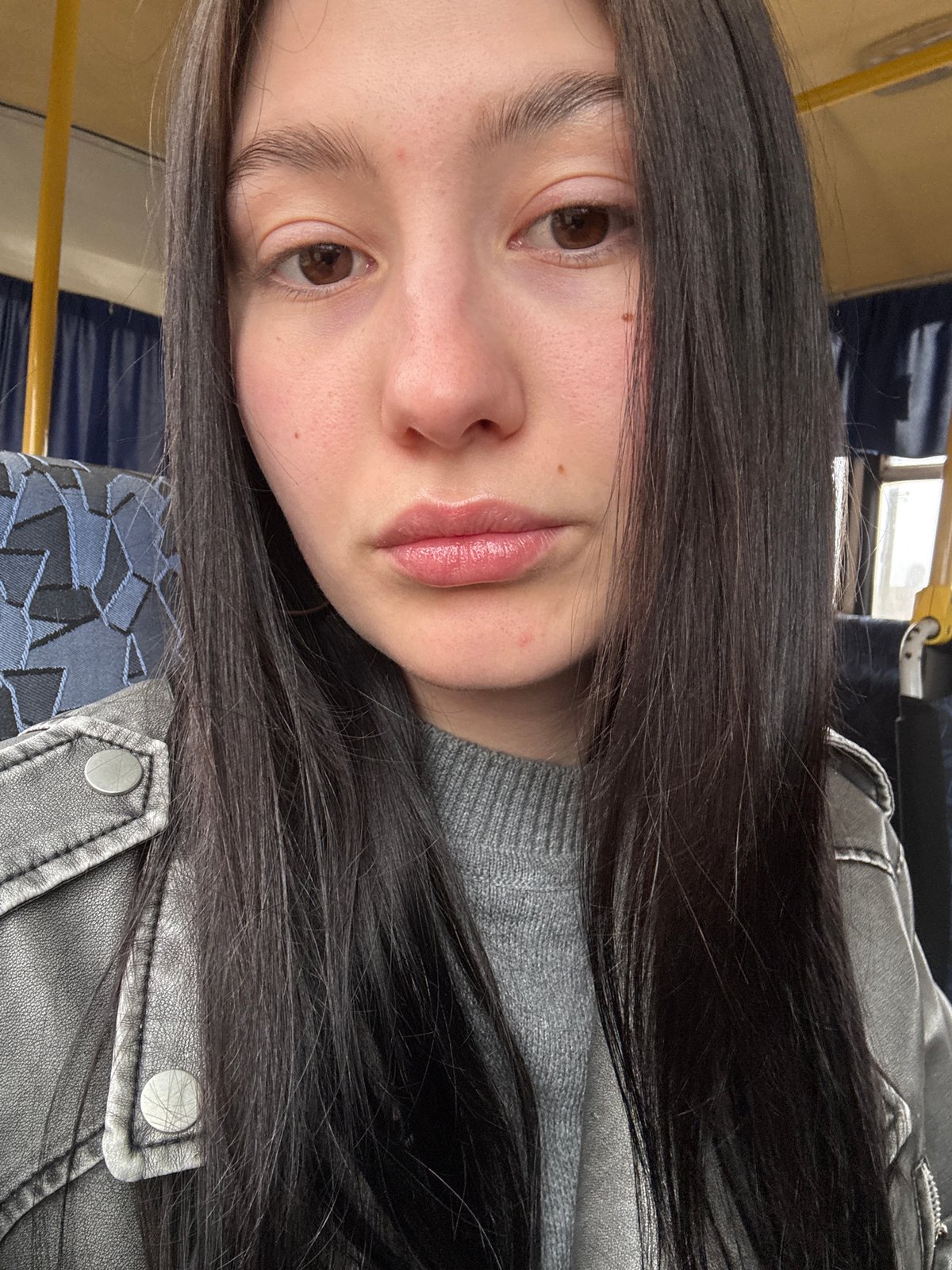 Morning commuter takes selfie on public transport in Russia