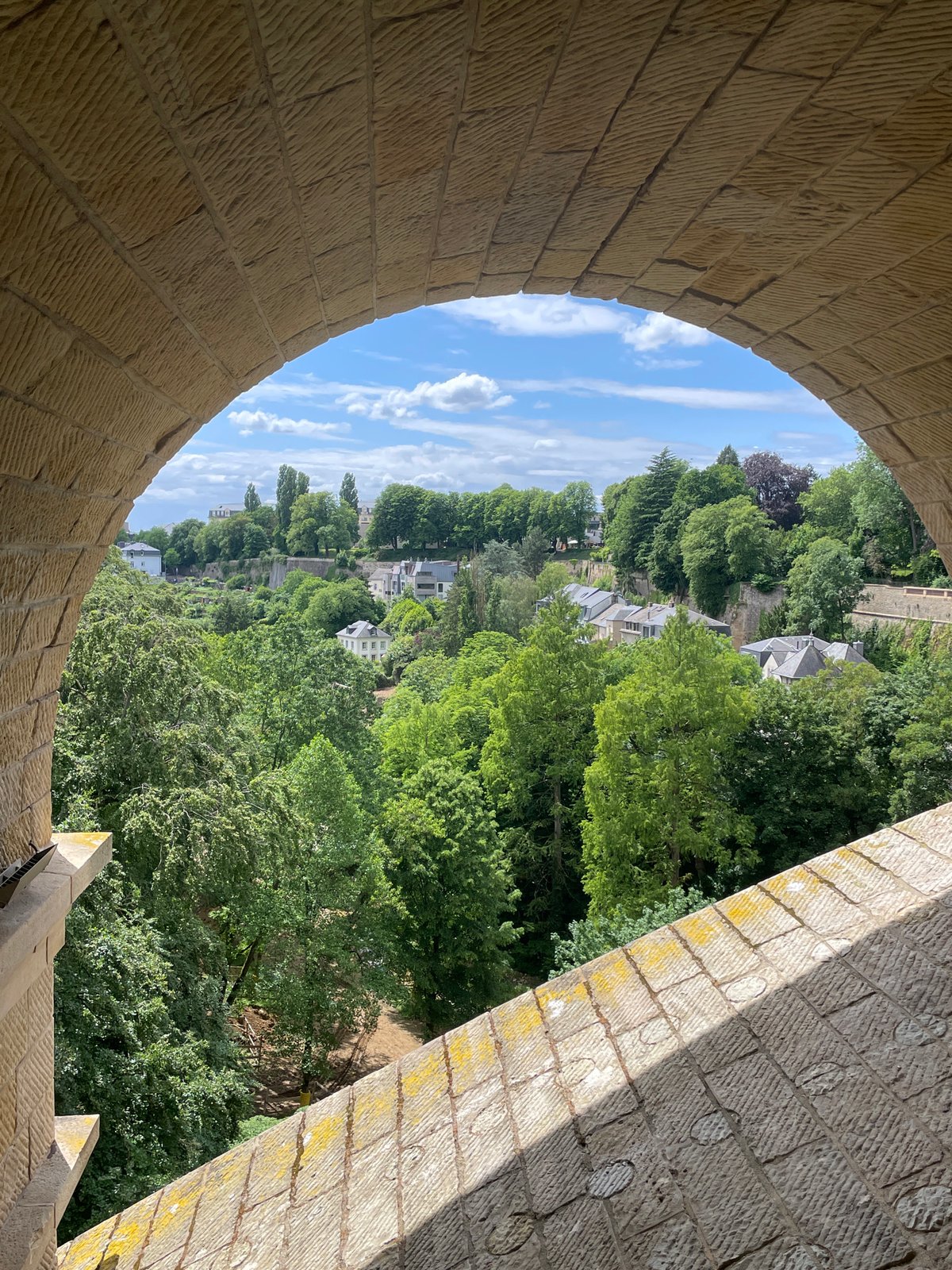 Tourist documents Luxembourg City landmarks during 15-minute walking tour
