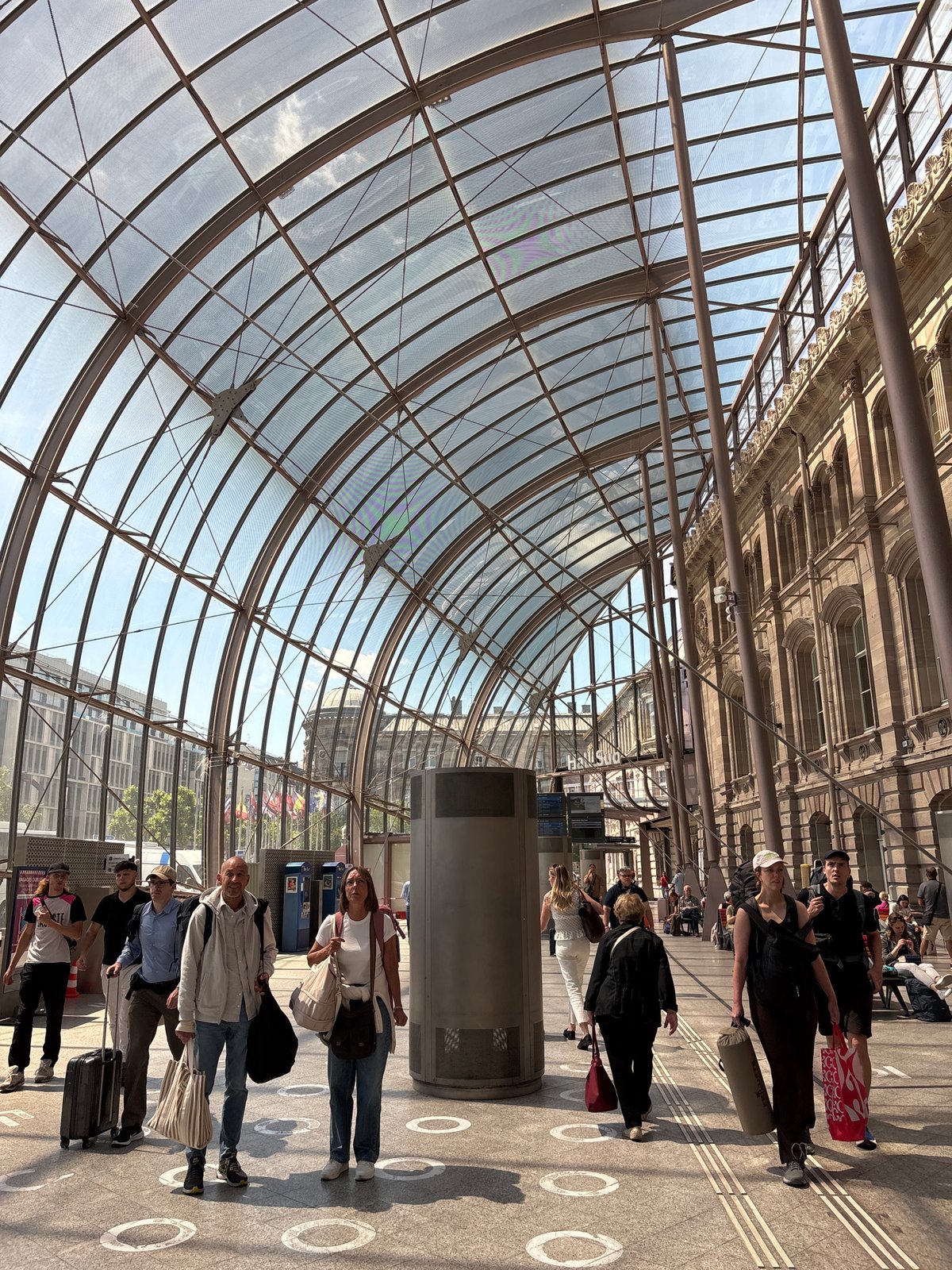 Train journey through Strasbourg station with travel comfort gear