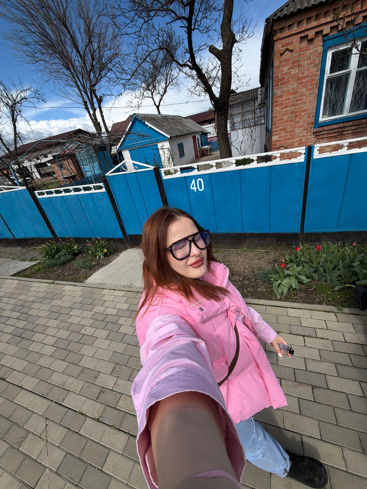 Woman in pink jacket spotted multiple times with stroller