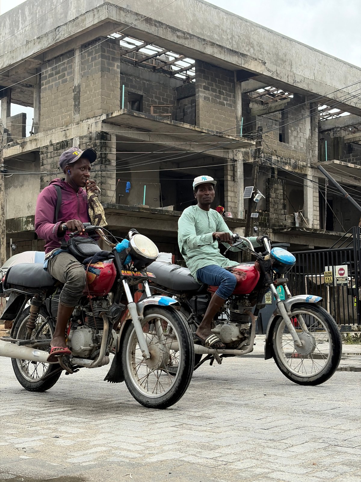 Everyday street life on a wet afternoon in Igboefon