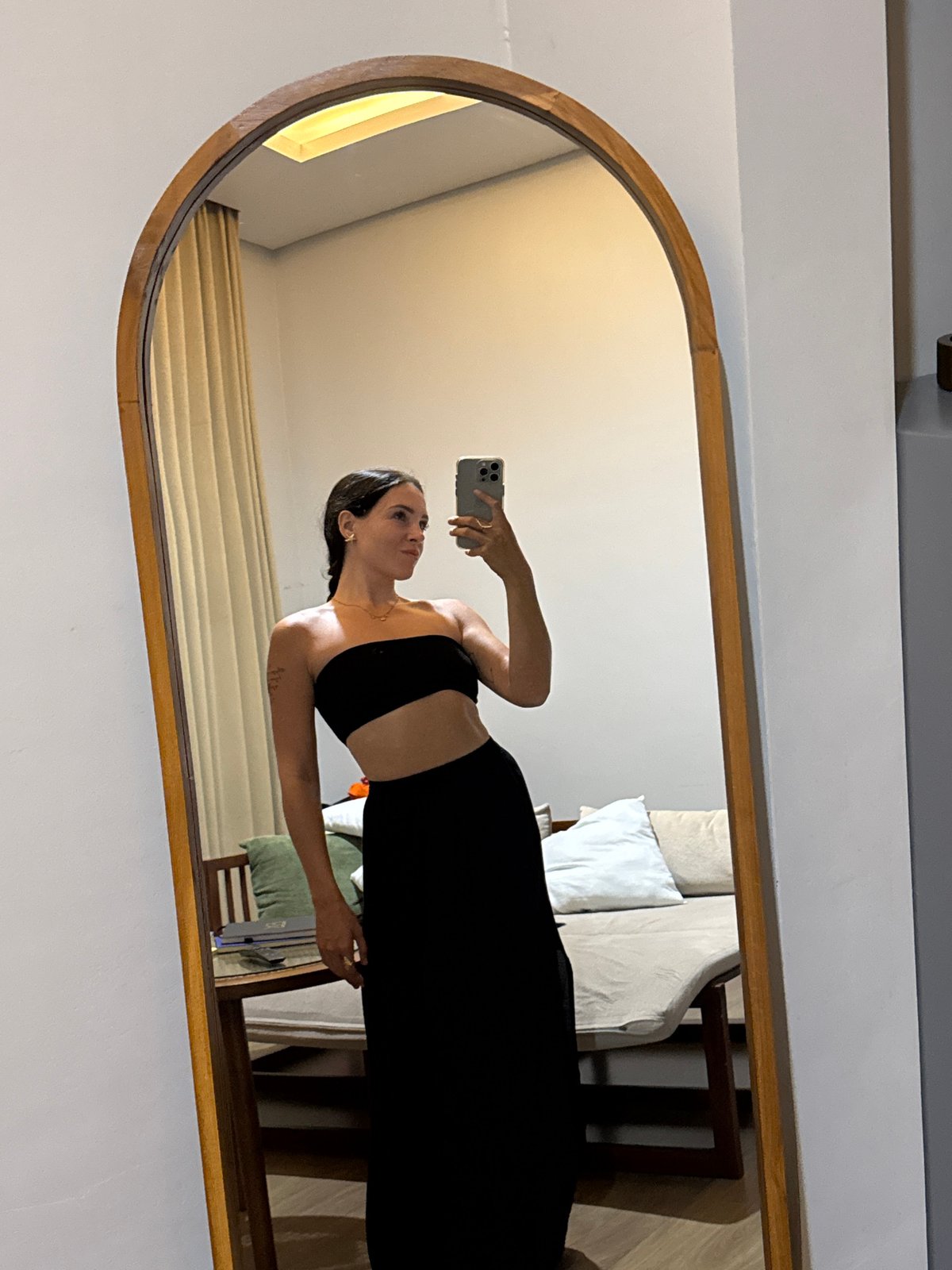Outfit photos and mirror selfies from a Bali hotel room