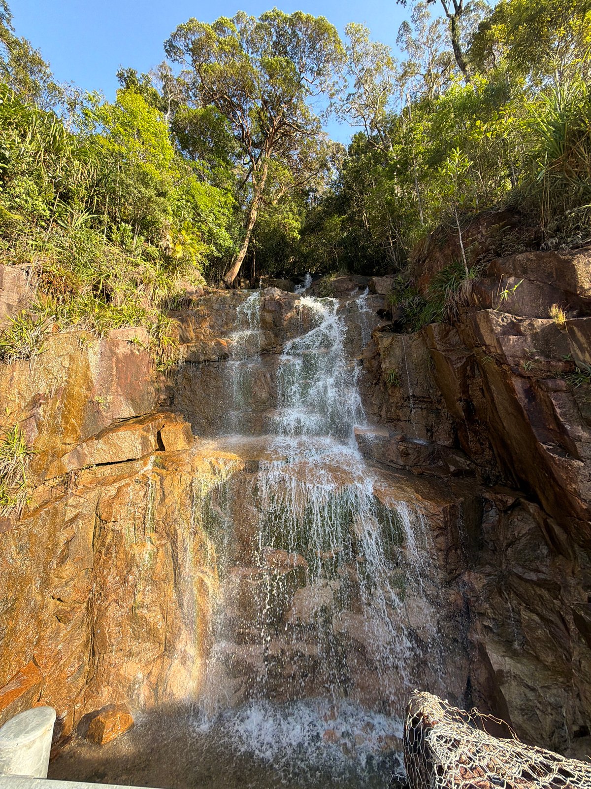Tiered waterfall with rocky cascade in Nam Khanh Vinh, Vietnam