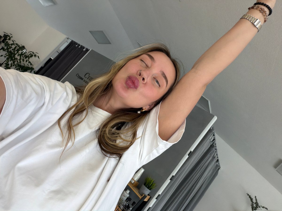 Woman takes multiple selfies across Chaikovsky, Russia morning