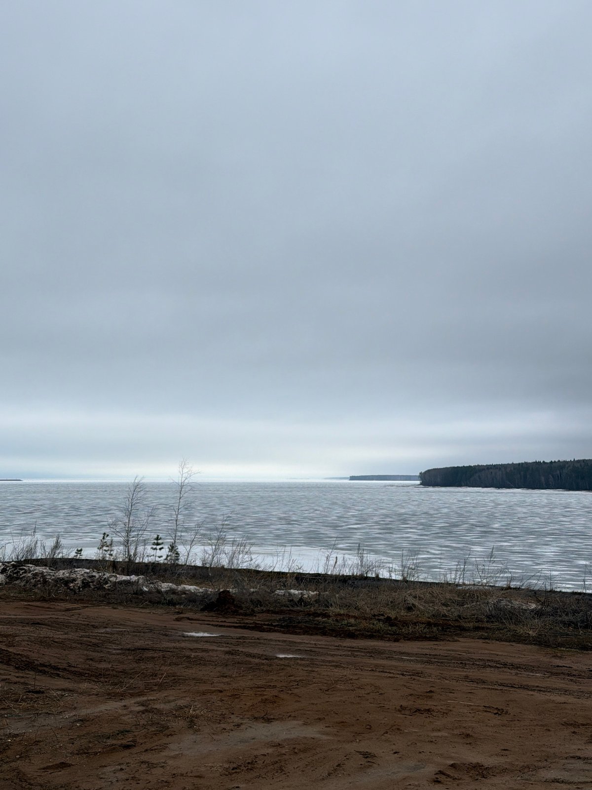 Morning scenes captured in Chaikovsky, Russia show waterfront and industrial views
