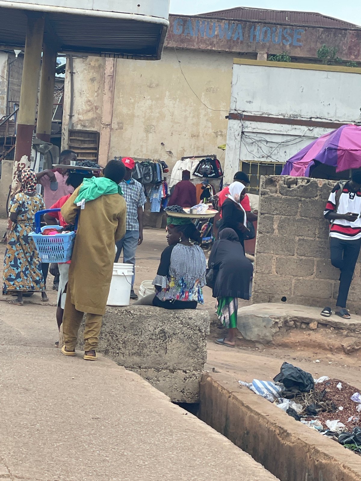 Urban marketplace daily life documented across four-hour period
