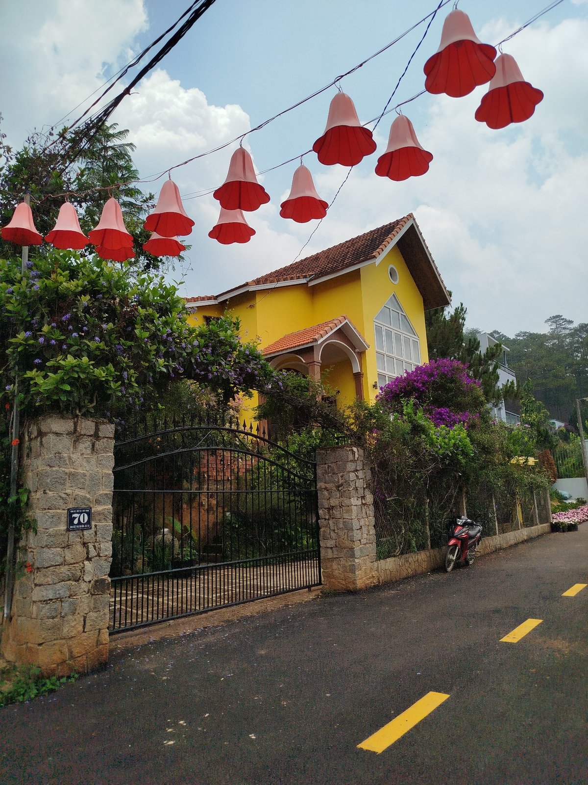 Yellow house with red roof documented in Hiep Thanh Vietnam