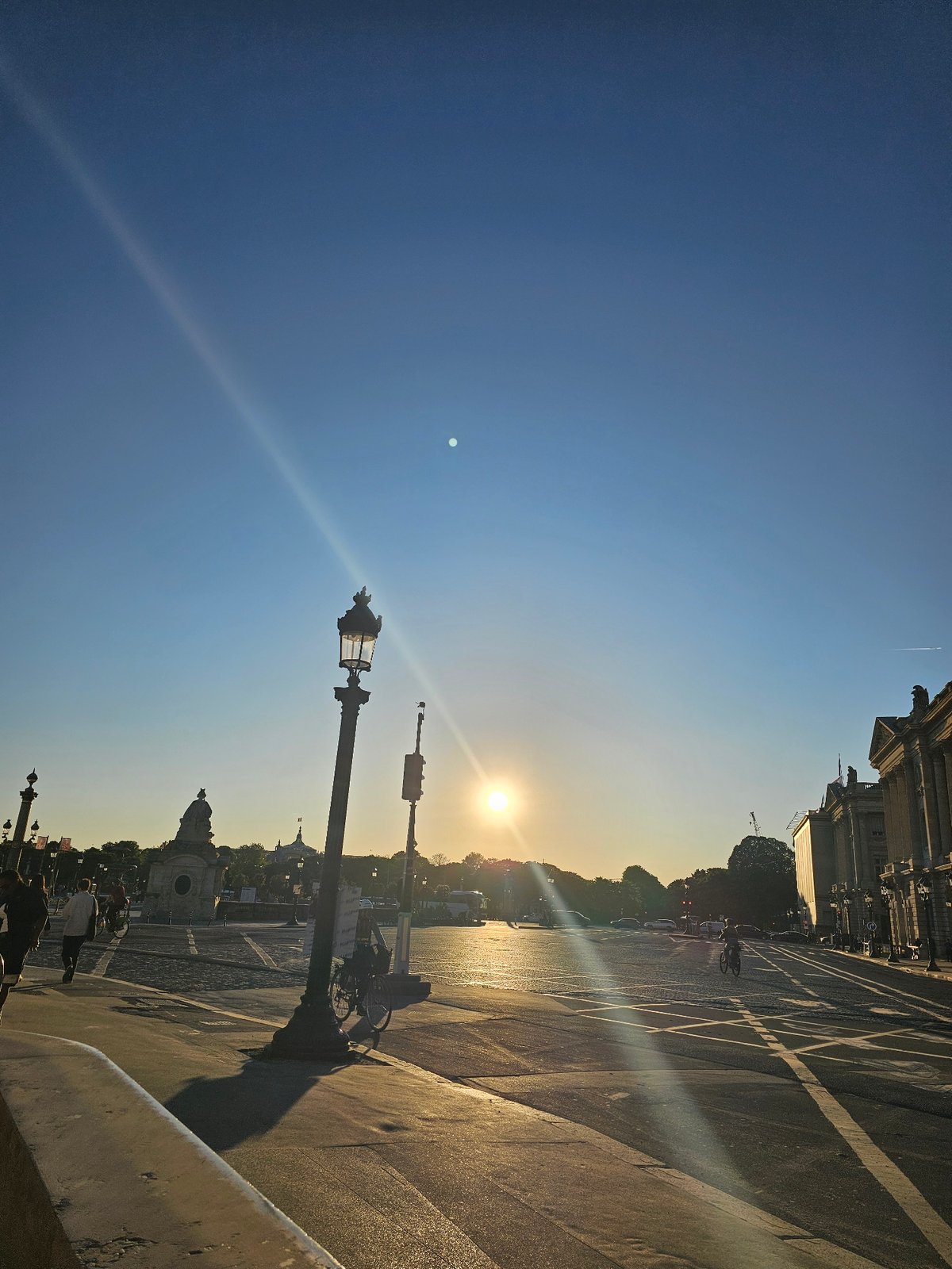 Golden hour scenes documented across Paris streets and parks