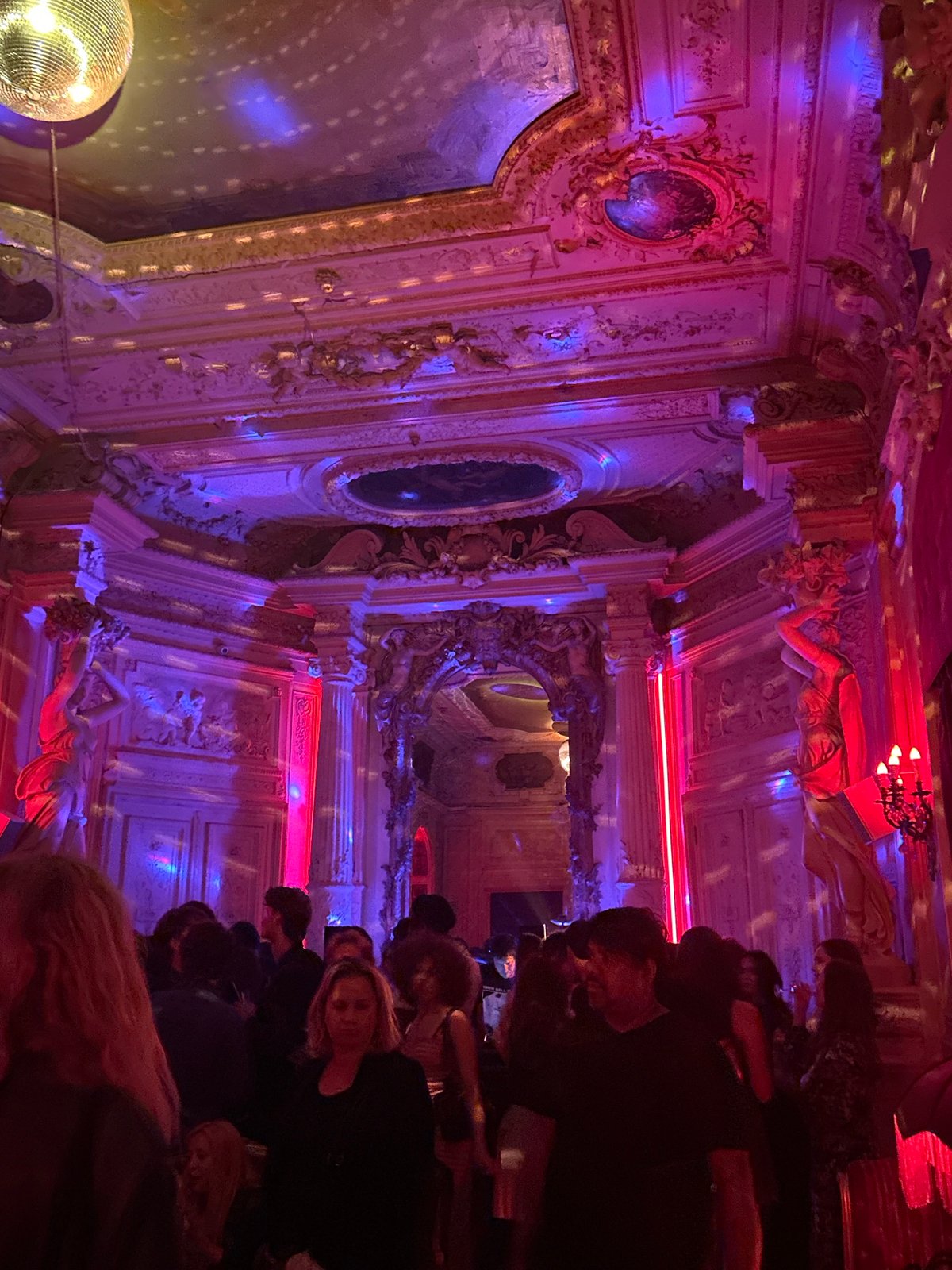 Late night gathering at ornate Paris nightclub venue