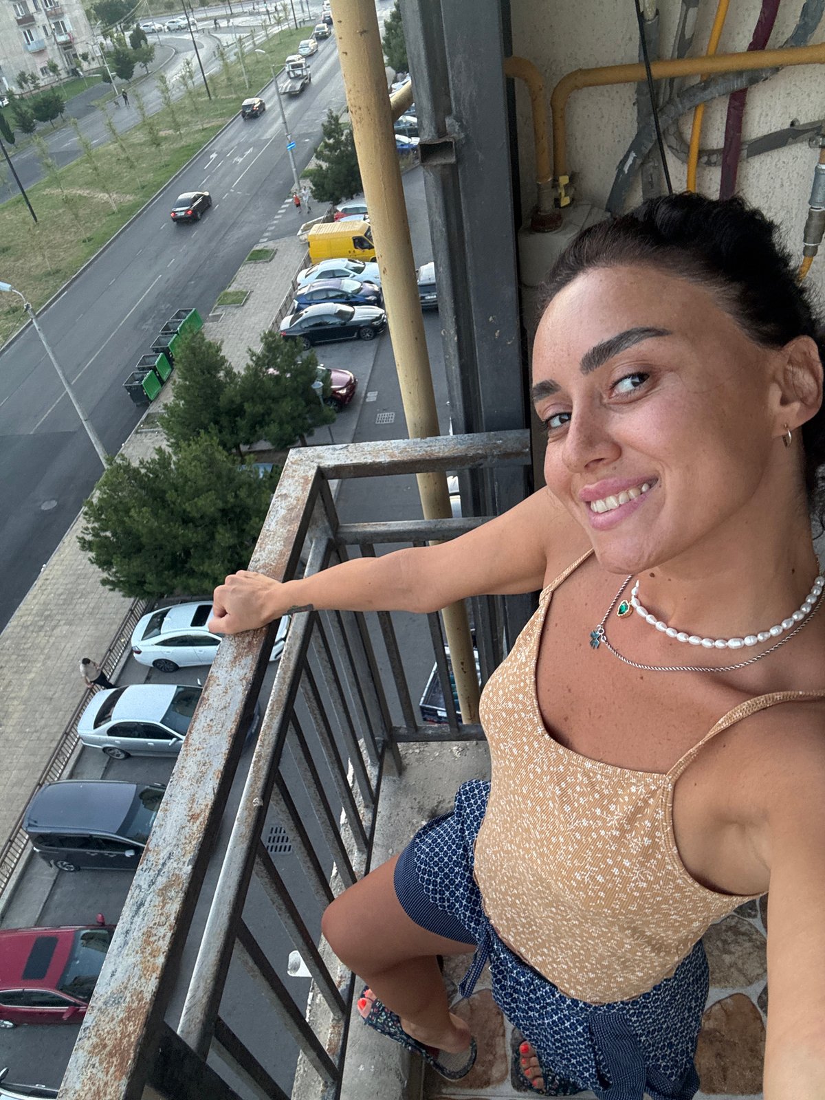 Casual afternoon selfies from a Tbilisi balcony and apartment
