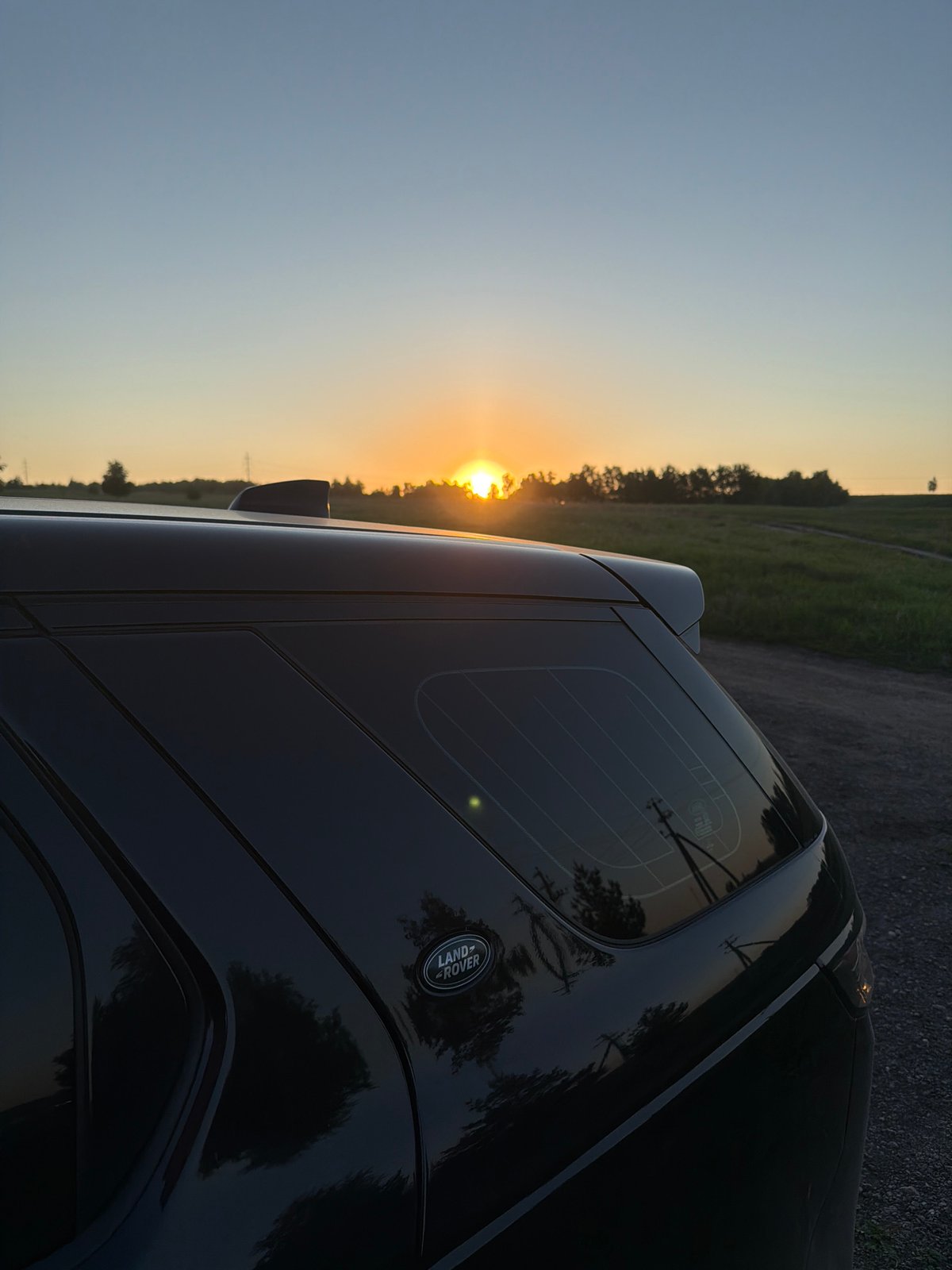 Land Rover photographed multiple times in rural Krasnoyarsk settings
