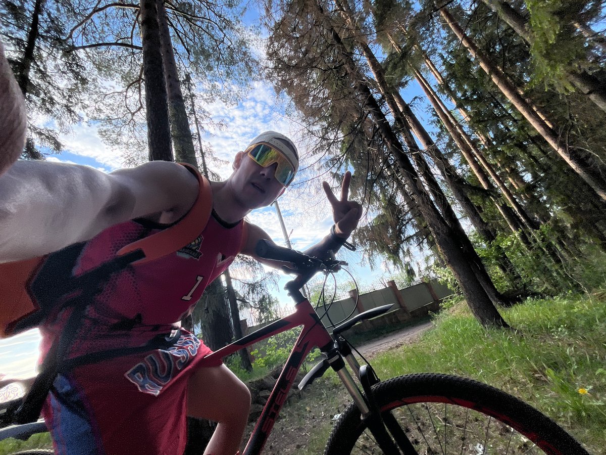 Cyclist enjoys family outdoor recreation time in Chaikovsky, Russia