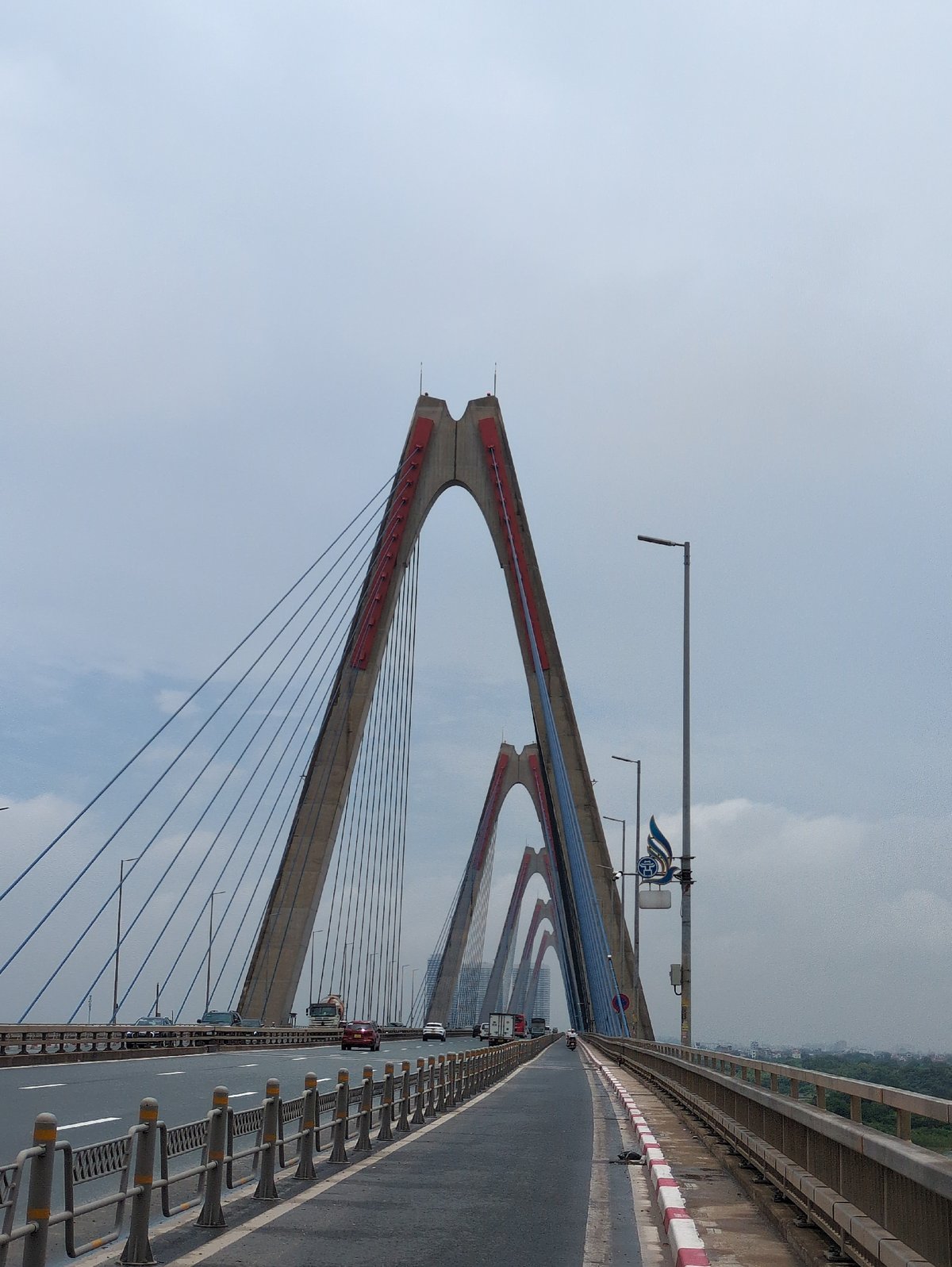 Nhat Tan Bridge and Hanoi's hazy Red River waterfront