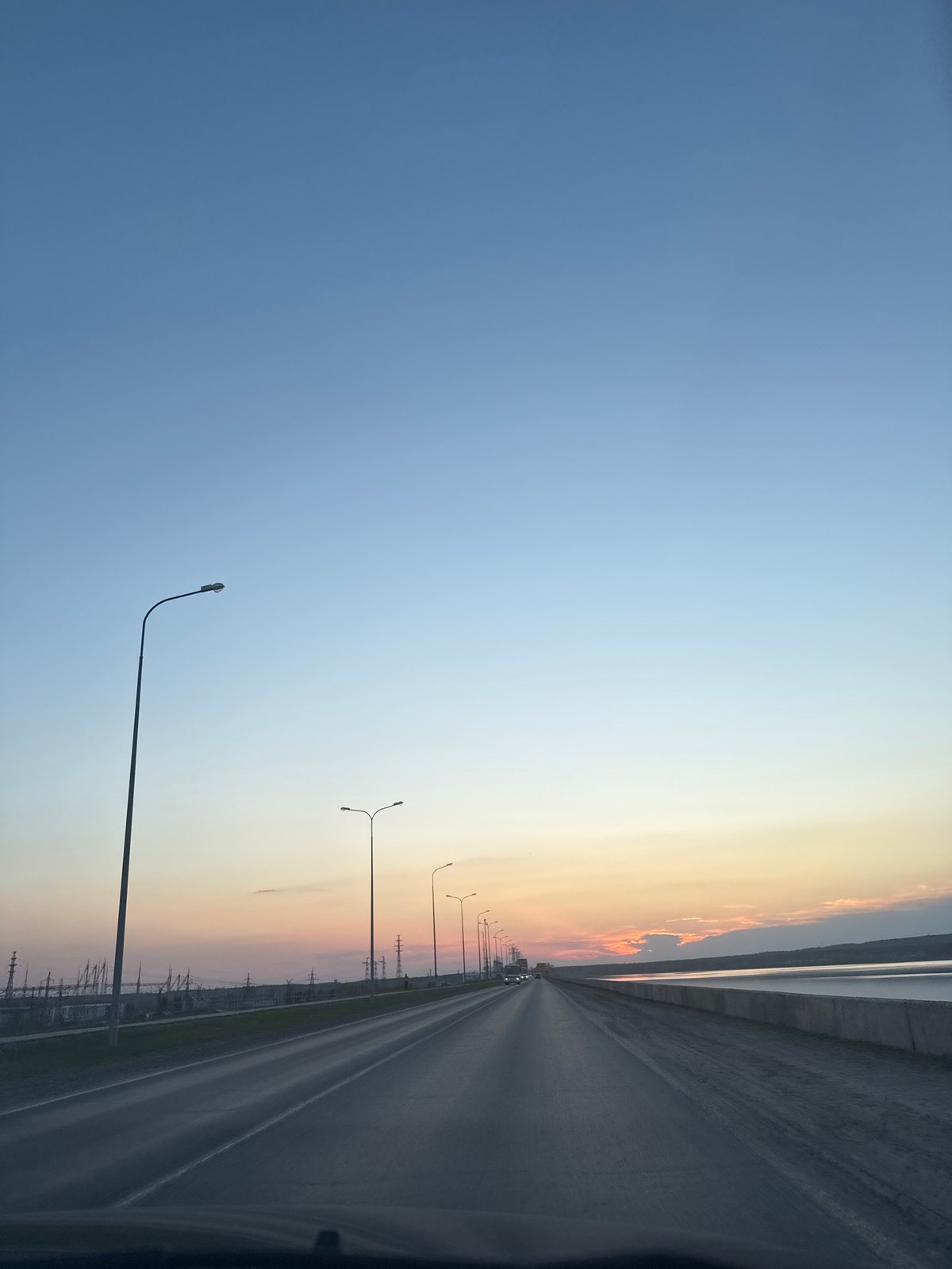 Sunset highway scenes documented in Chaikovsky, Russia