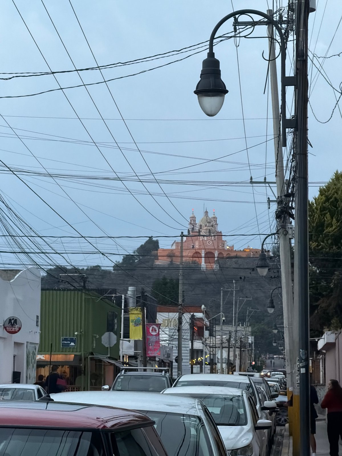 Dense electrical wires documented in San Andrés Cholula street