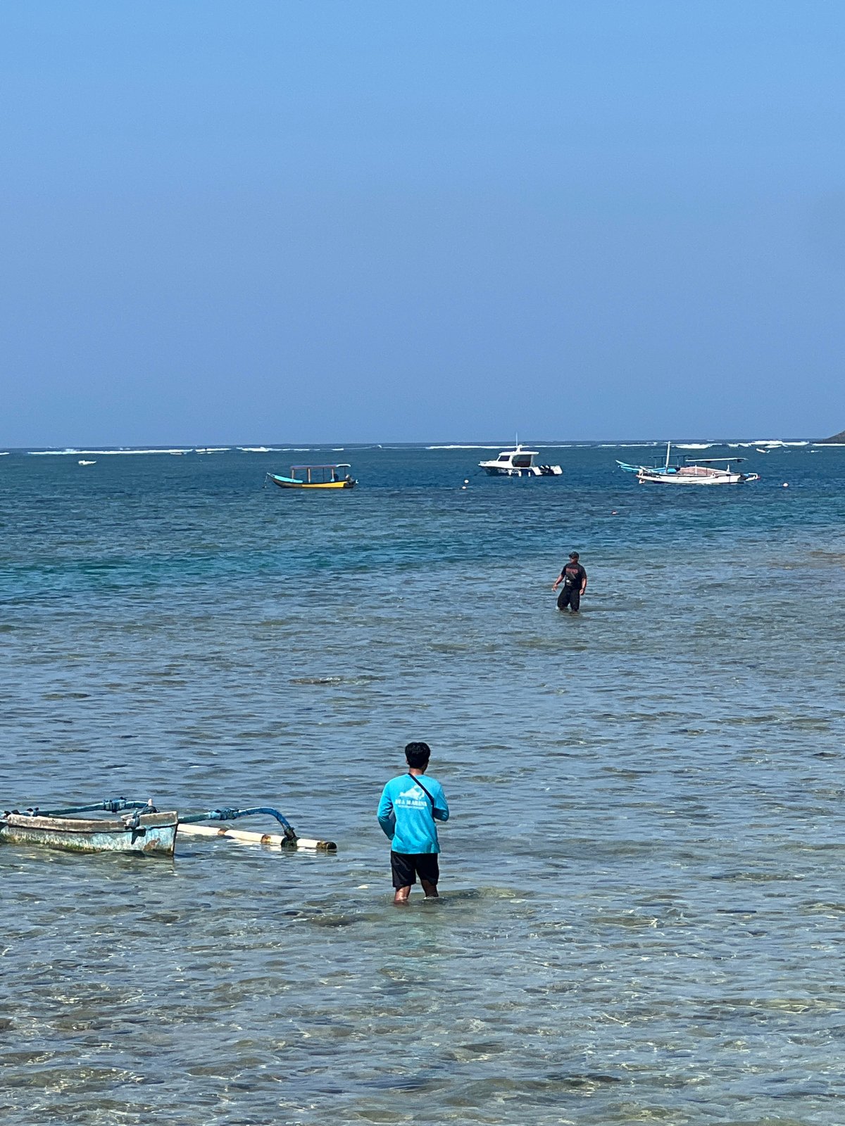Snapshots along a busy Denpasar coastline on a clear day