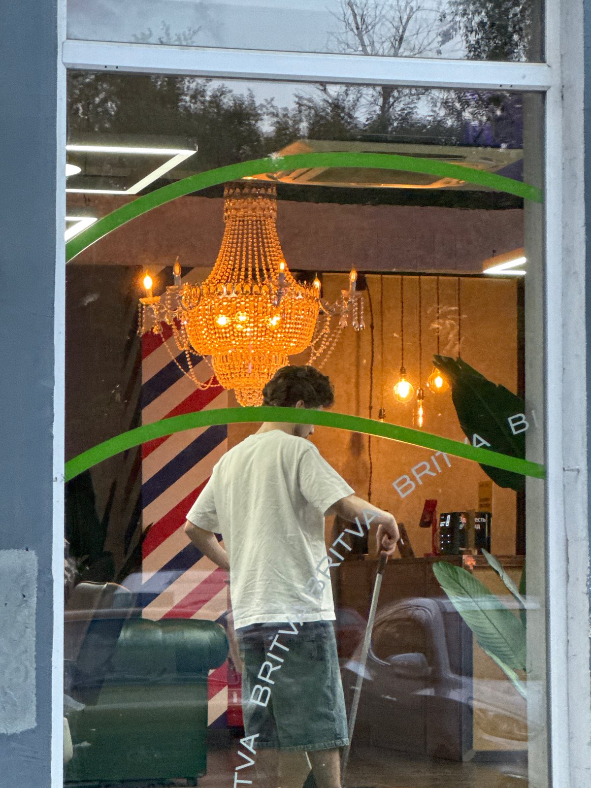 Evening scenes captured in Moscow: barbershop interior, dramatic sunset