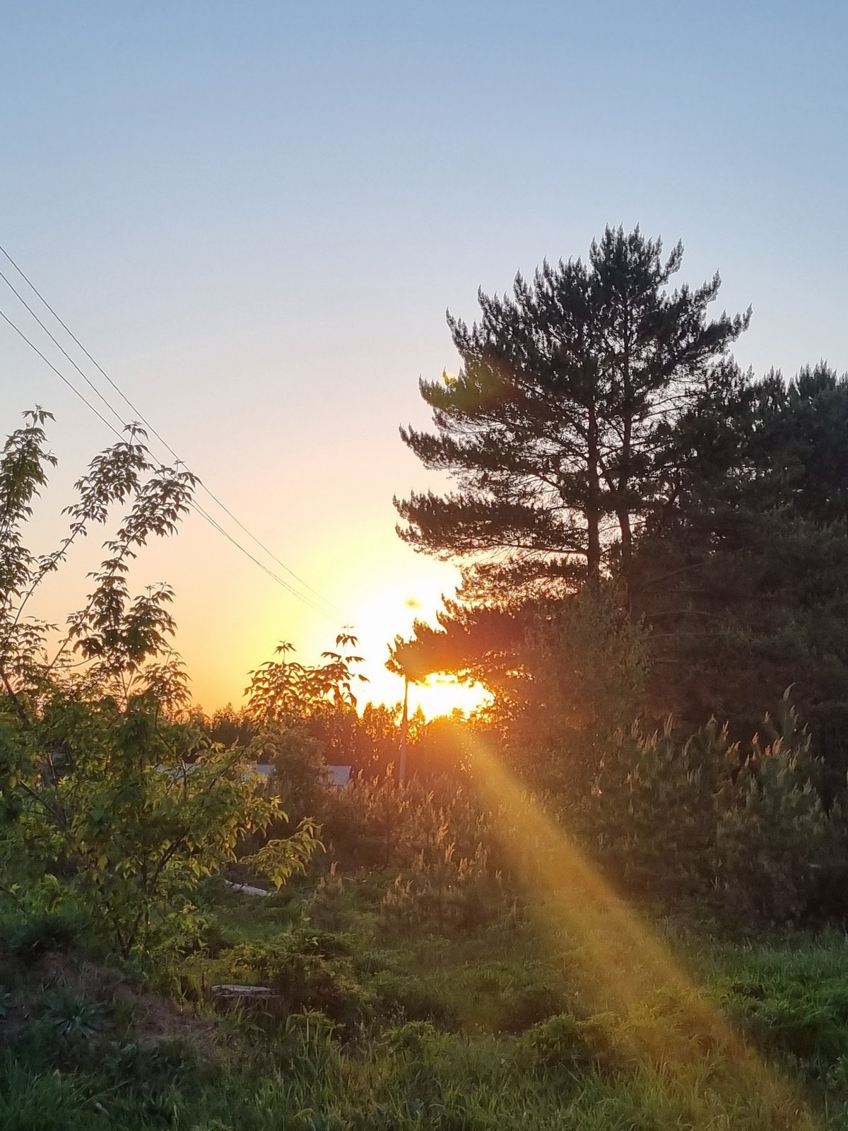 Evening stroll documented in Chaikovsky, Russia features blue-domed church