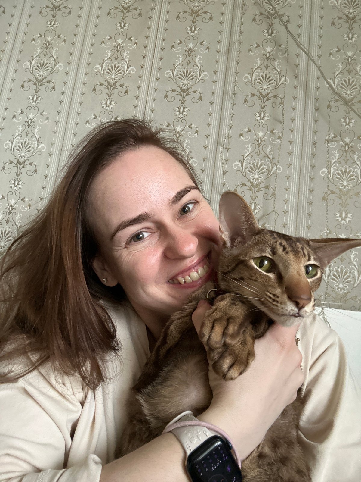 Moscow woman shares joyful moments with pet cat