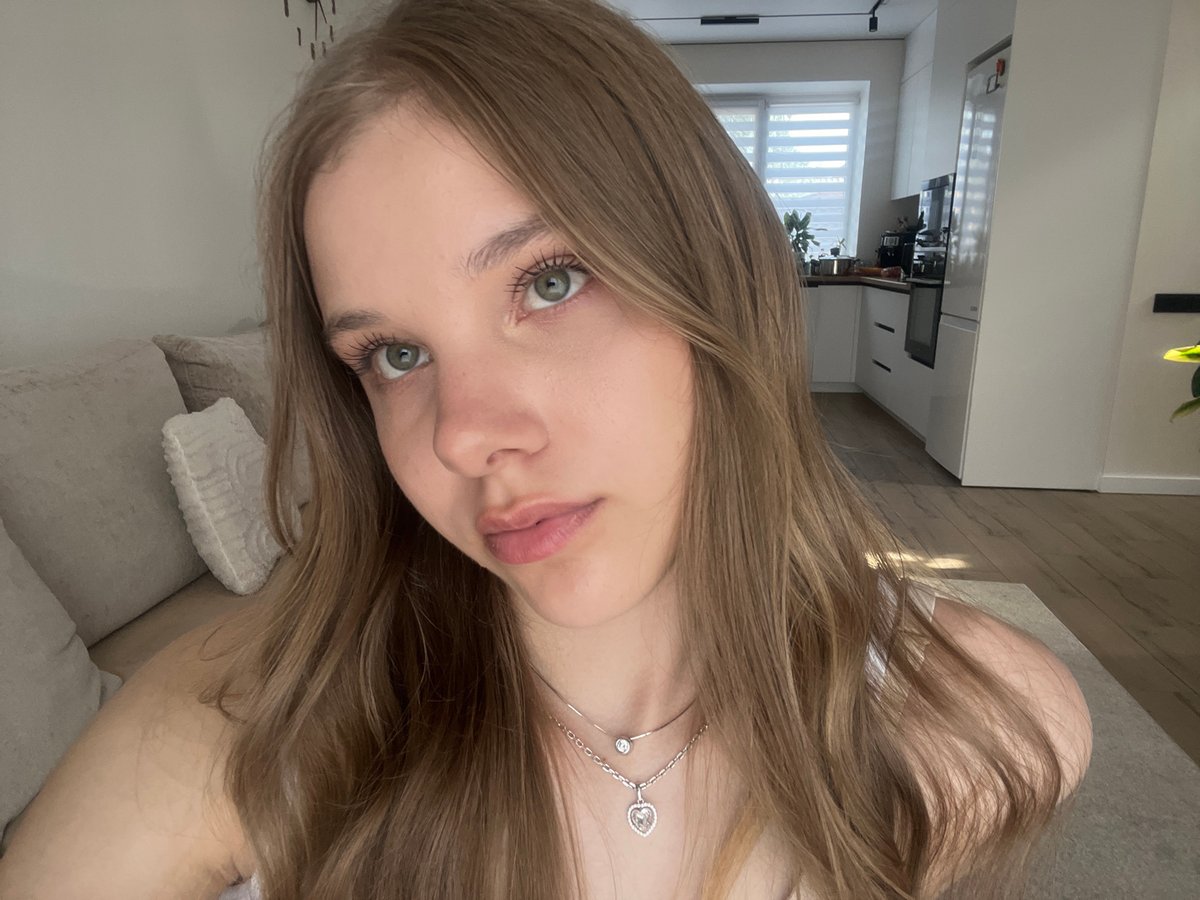 Woman takes playful selfies at home in Votkinsk