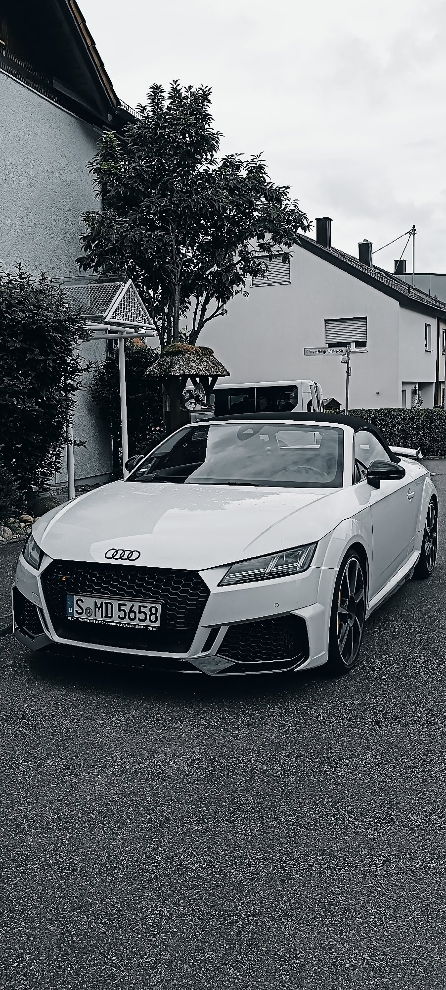 Nautical garden display and parked convertible outside Waiblingen home
