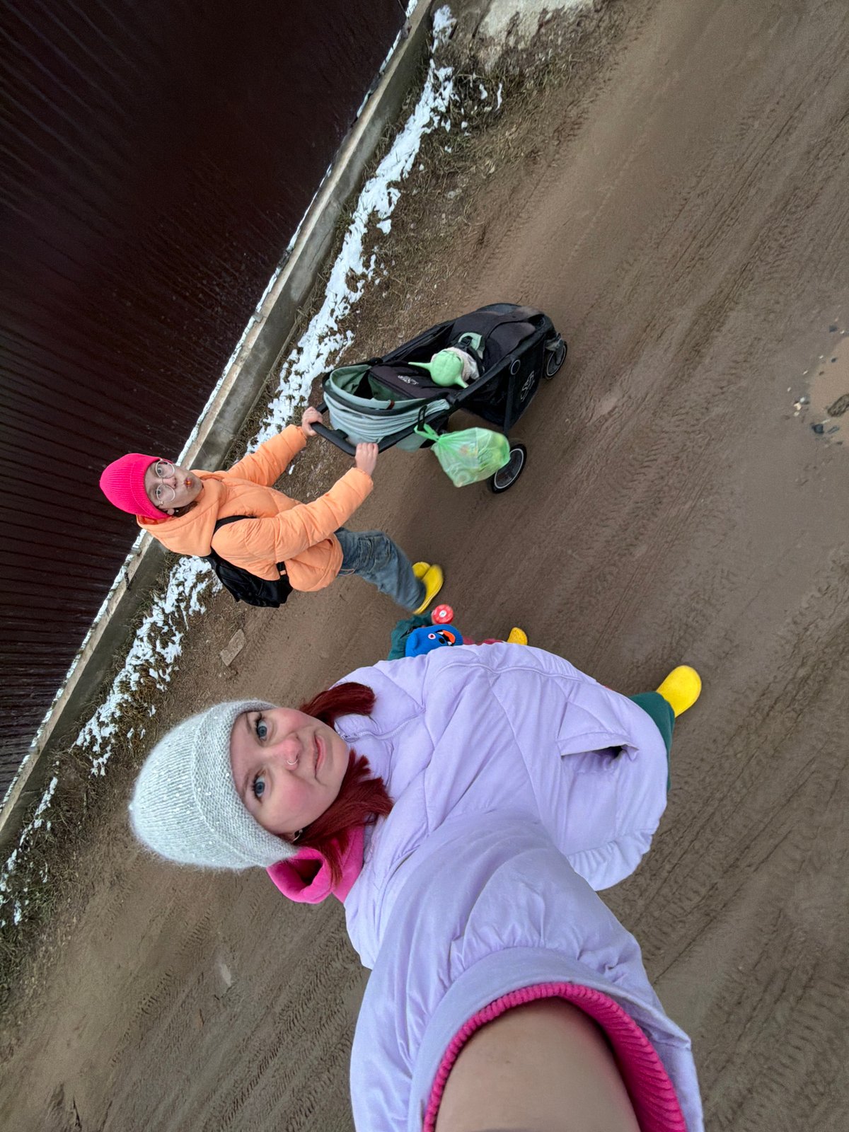 Mother and toddler's spring day outing in Chaikovsky, Russia