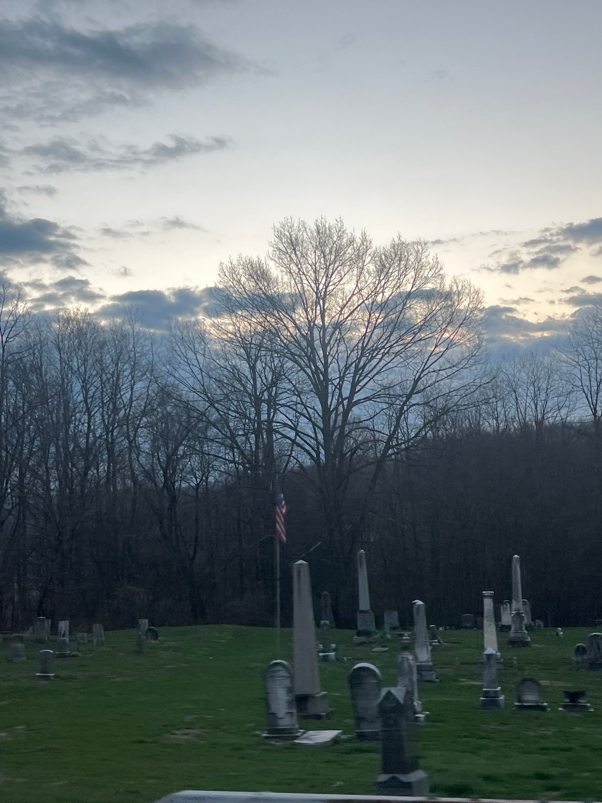 Marlboro scenes: graveyard with flag, house with eagle sculpture