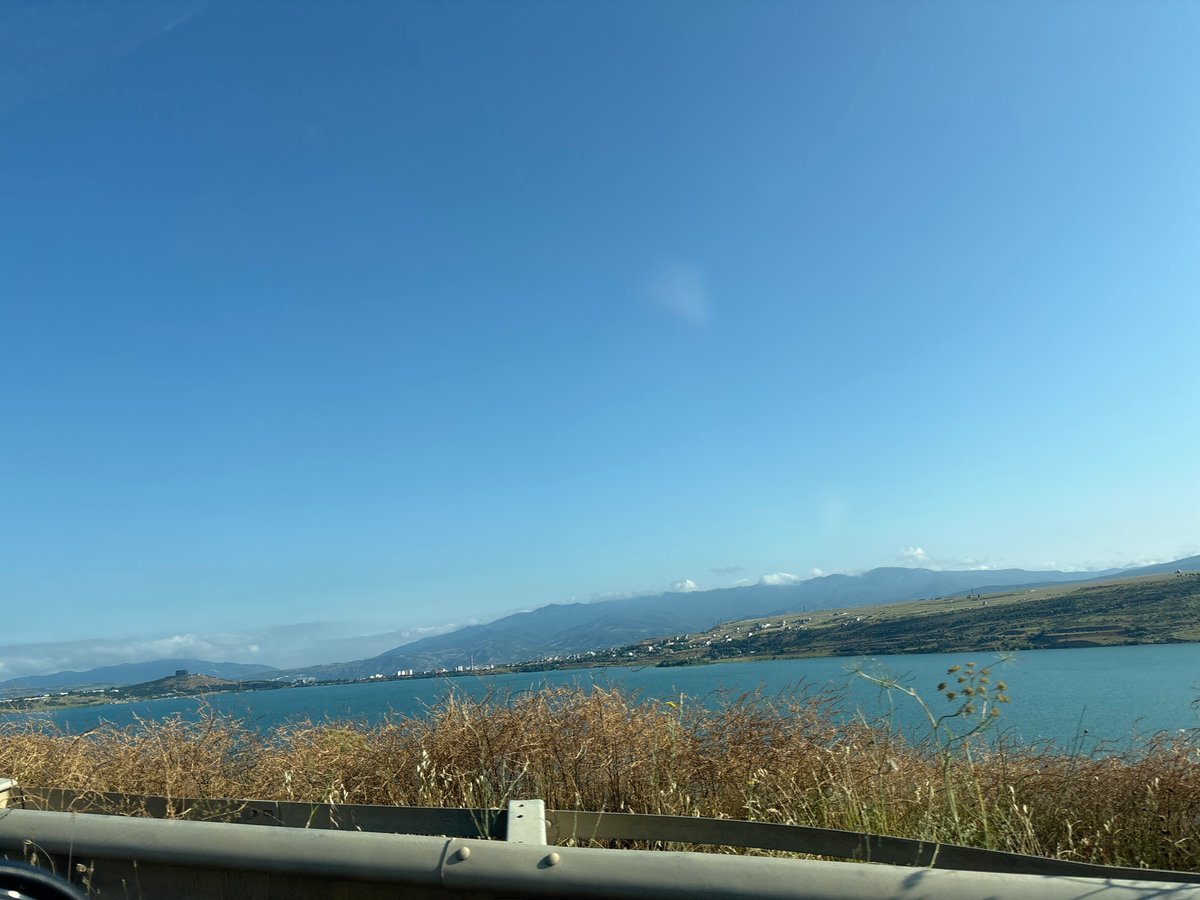 Driving the roads around Tbilisi Sea on a clear summer day