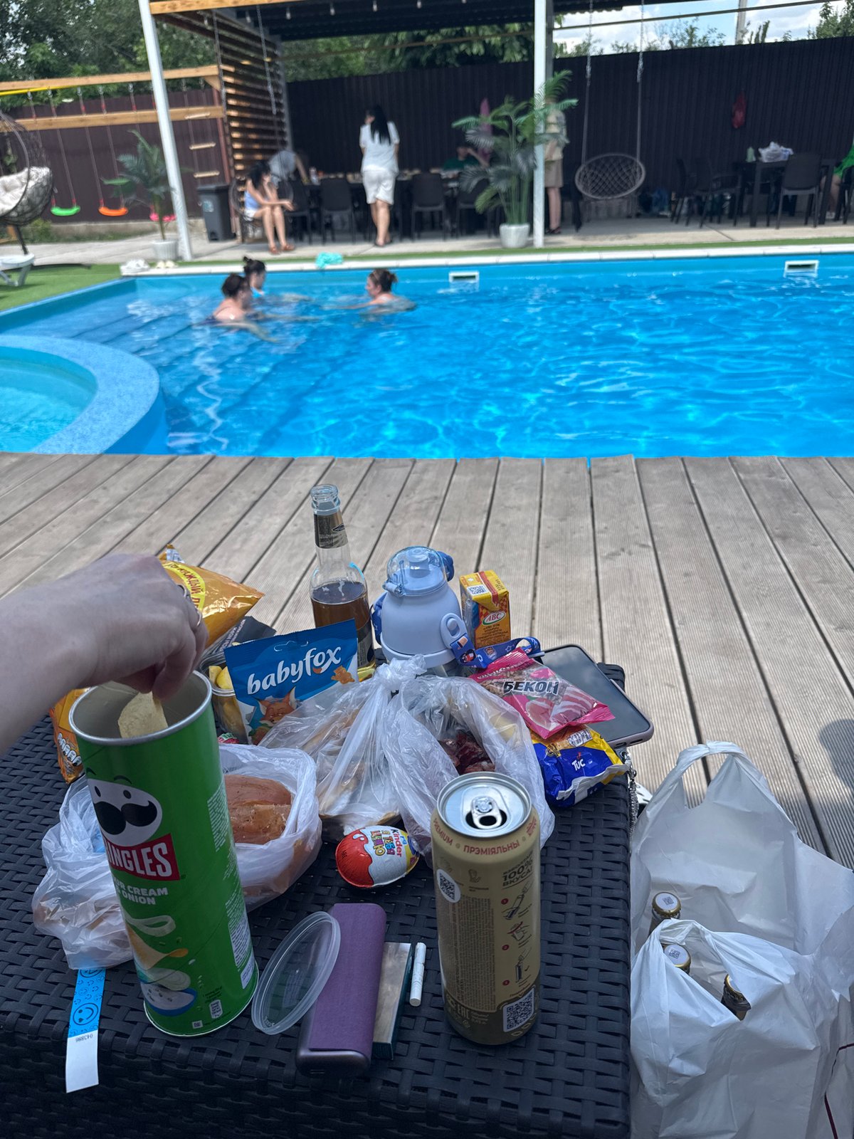 Lazy poolside afternoon with snacks, drinks, and selfies