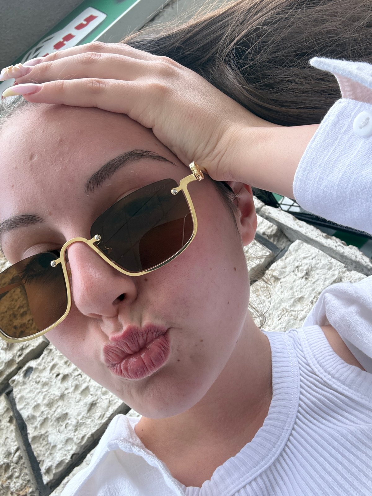 Woman takes selfies with elaborate nails in Burgas