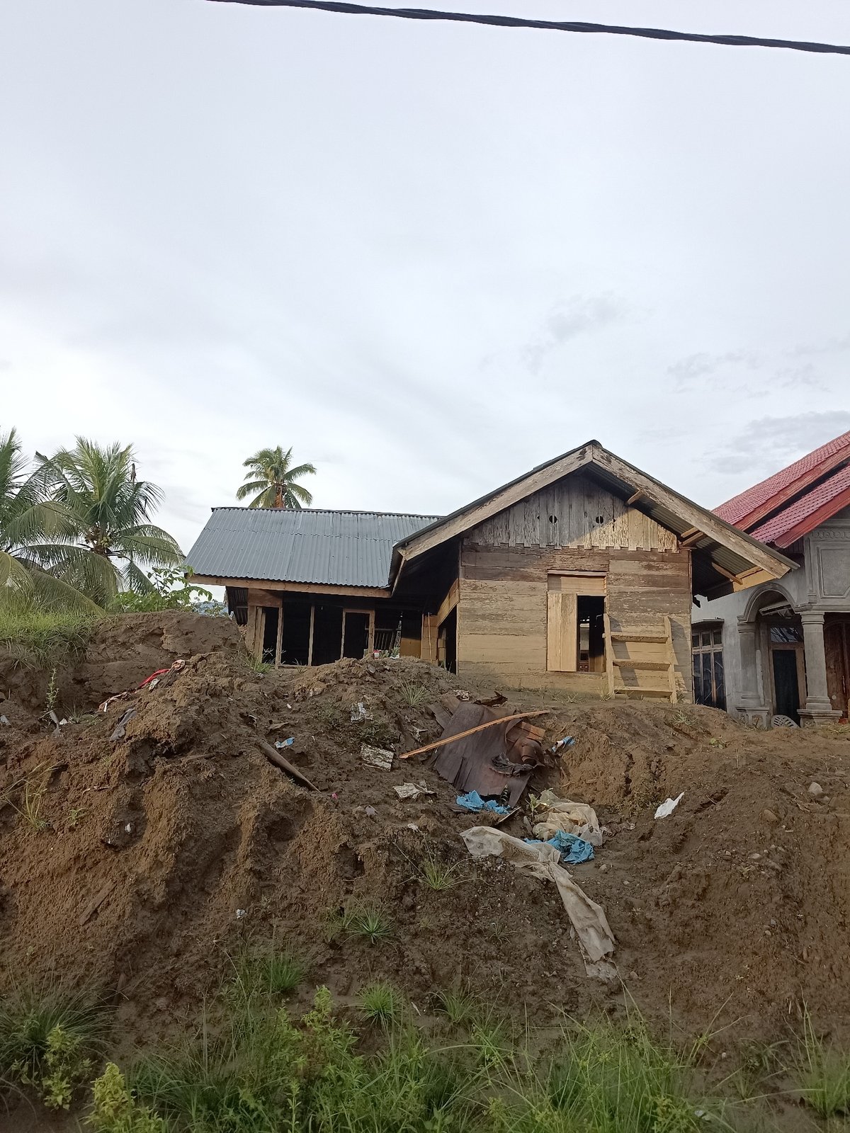 Landslide damage across a village in Meunasah Raya, Indonesia