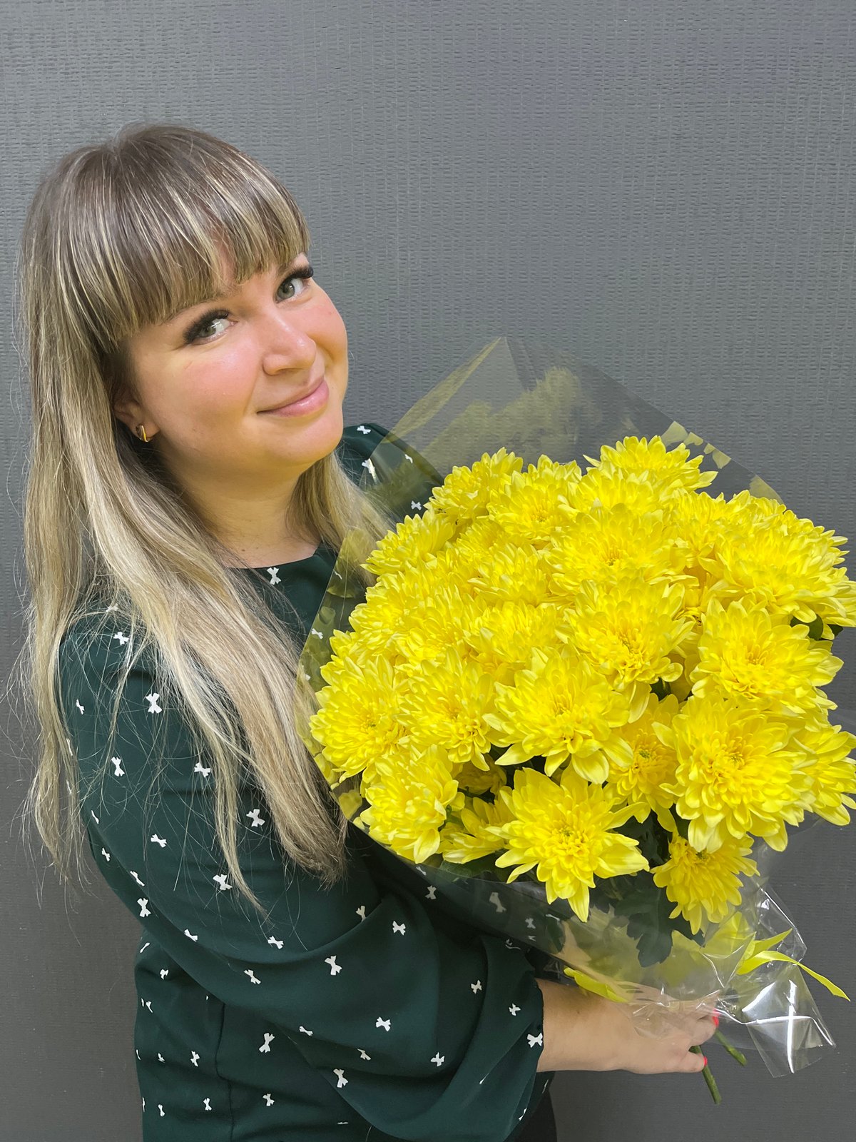 Woman poses with yellow chrysanthemums in early morning Izhevsk portrait