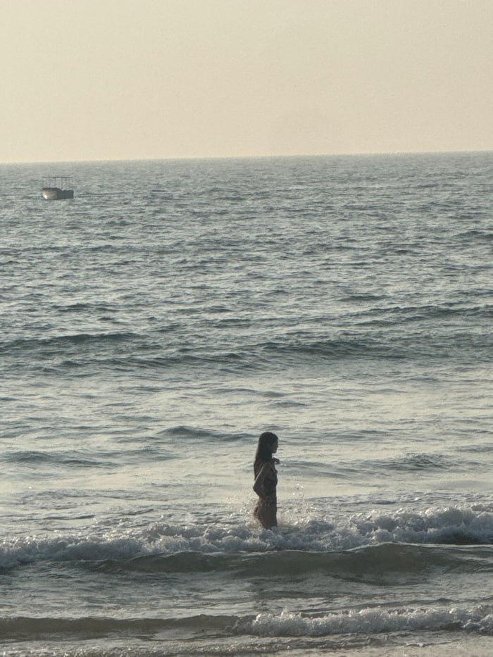 Beach day captured at Sinquerim, Goa with swimming and relaxation