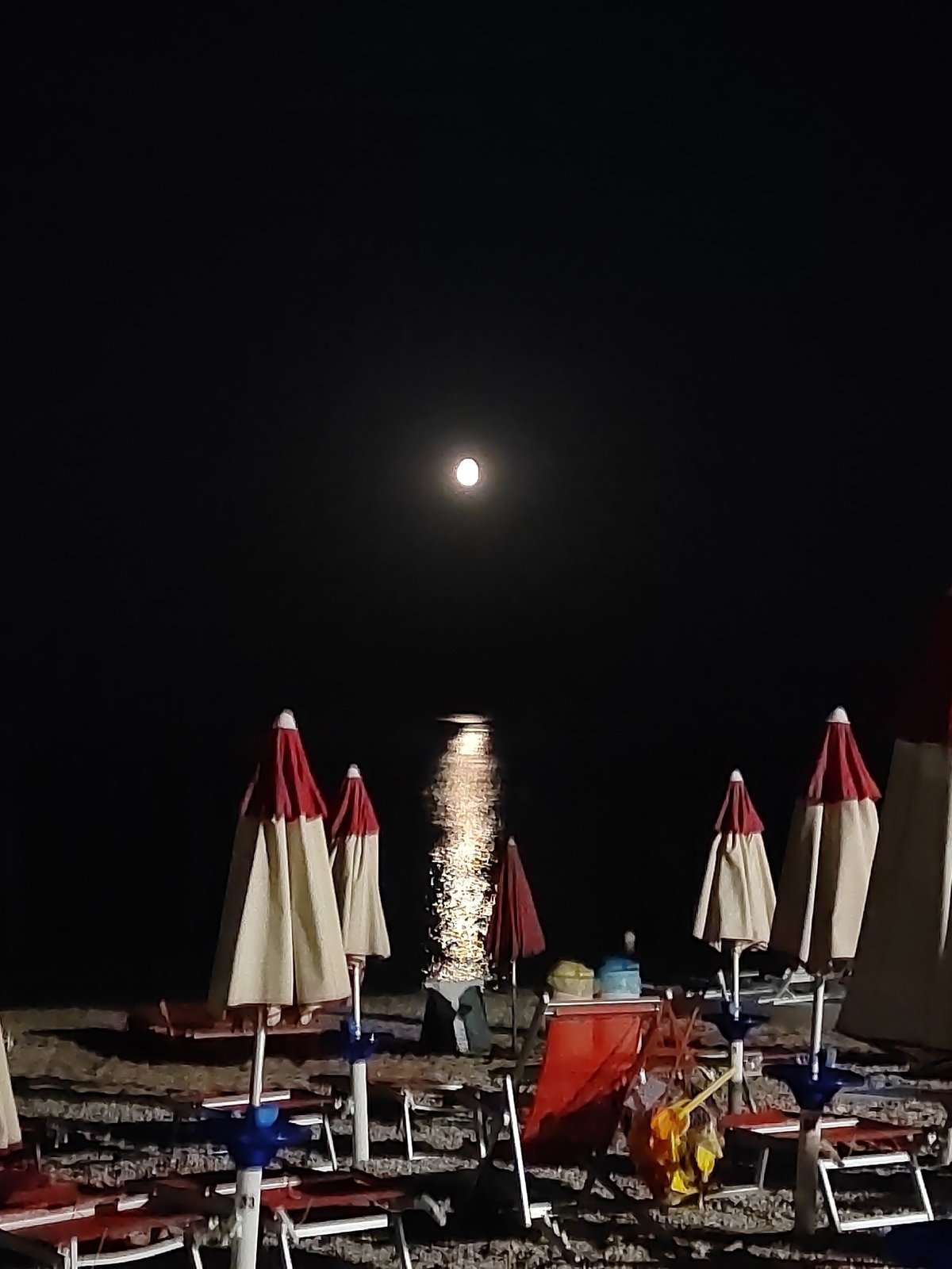 Full moon night at Porto Recanati's beach and seaside restaurant