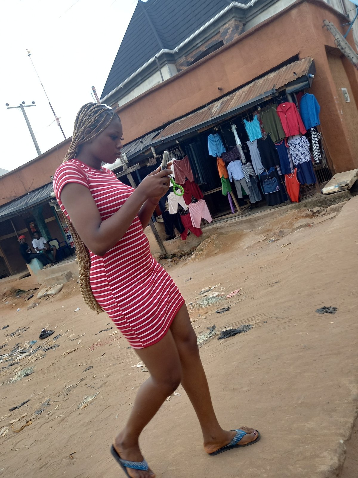 Daily life documented in Nigerian market streets and neighborhoods