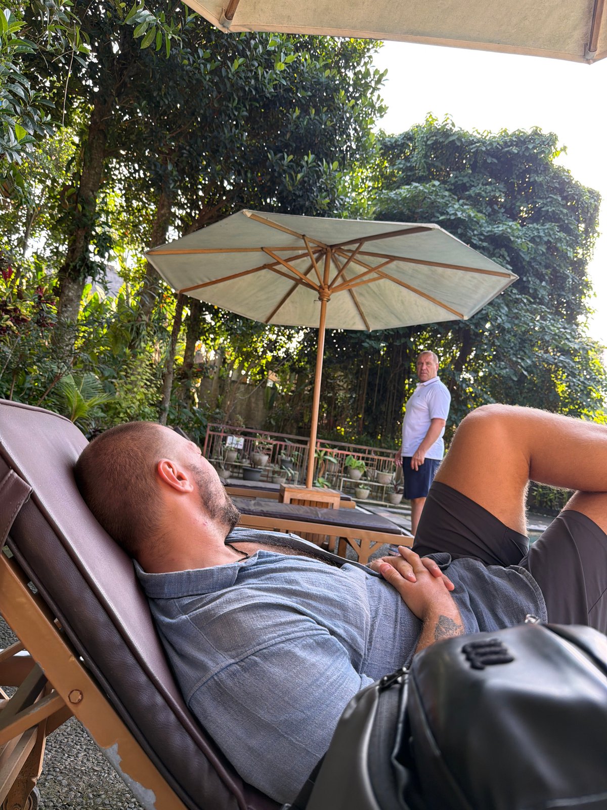 Ubud street life, temple statues, and poolside calm