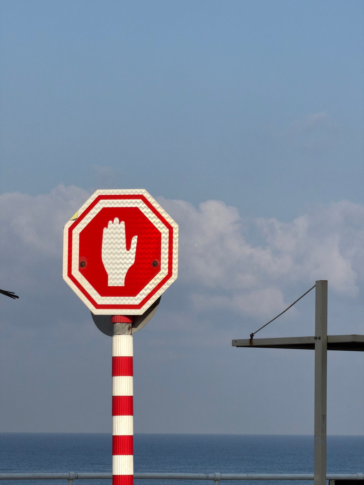 Street-level stop sign with hand symbol, Bat Yam, Israel