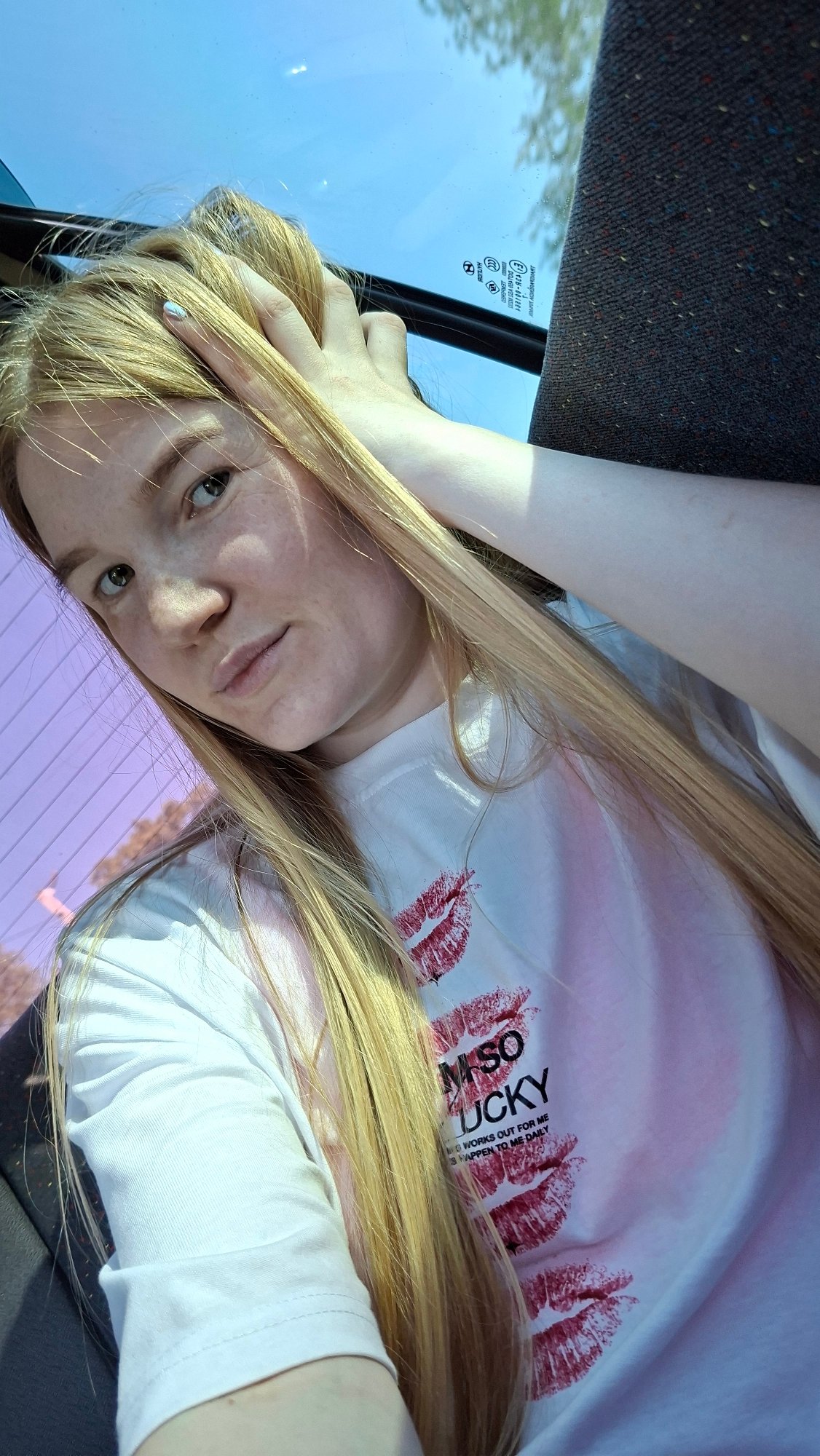 Woman takes car selfies in Большой Букор, Russia