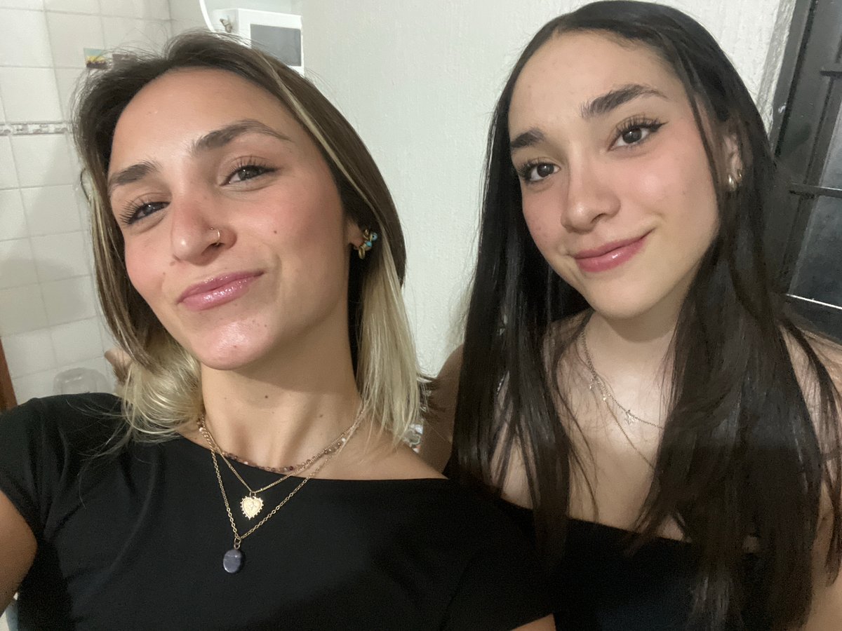 Two women take selfies in San Andrés Cholula