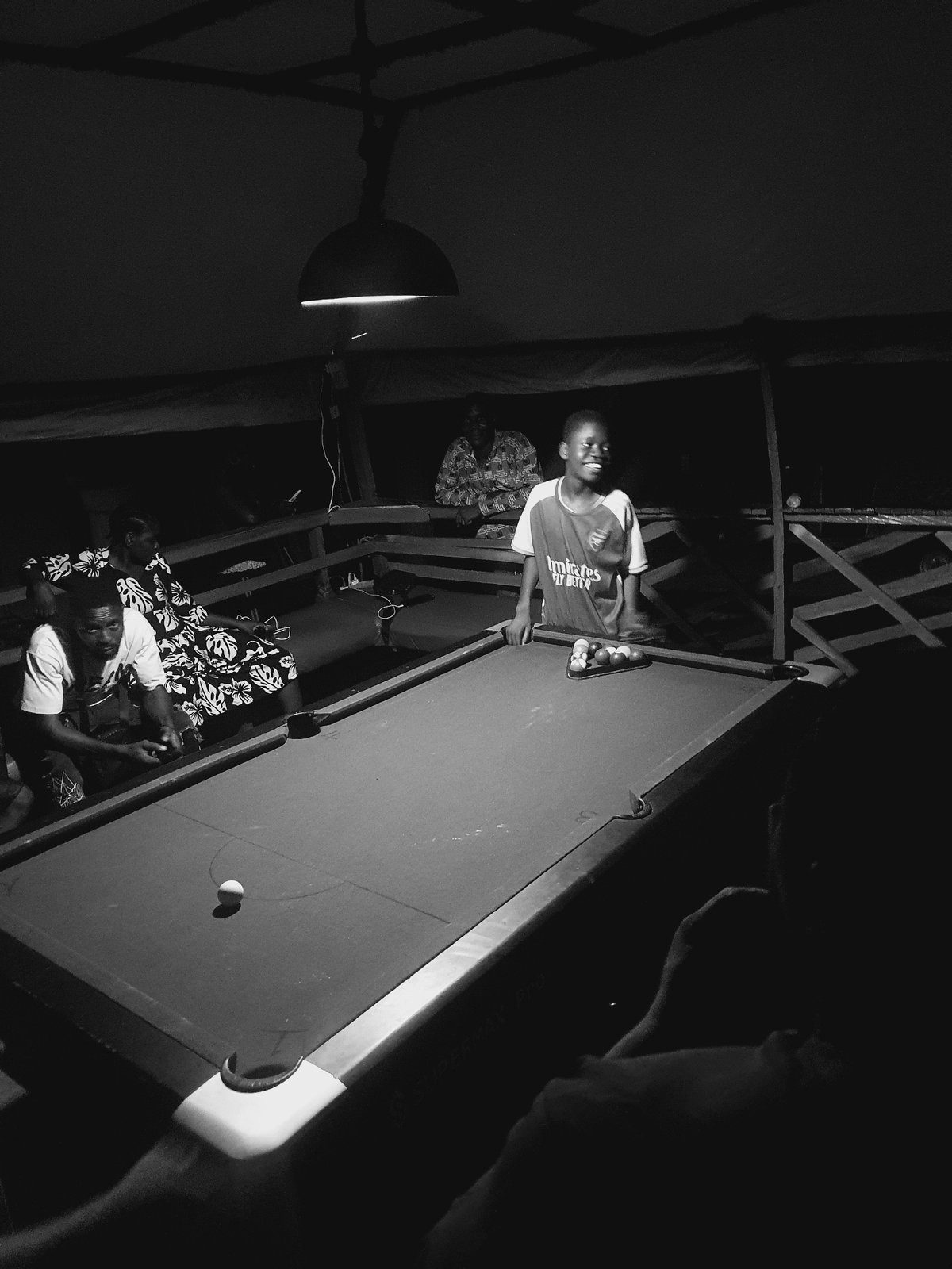 Evening billiards game draws crowd in Lokoja, Nigeria