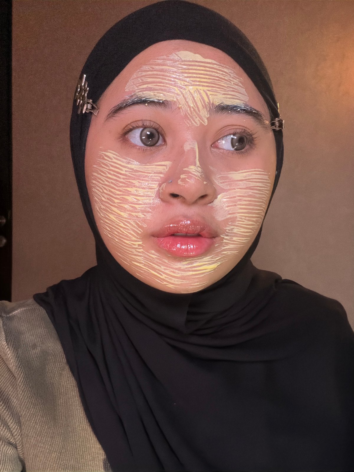 Woman performs morning skincare routine in East Jakarta