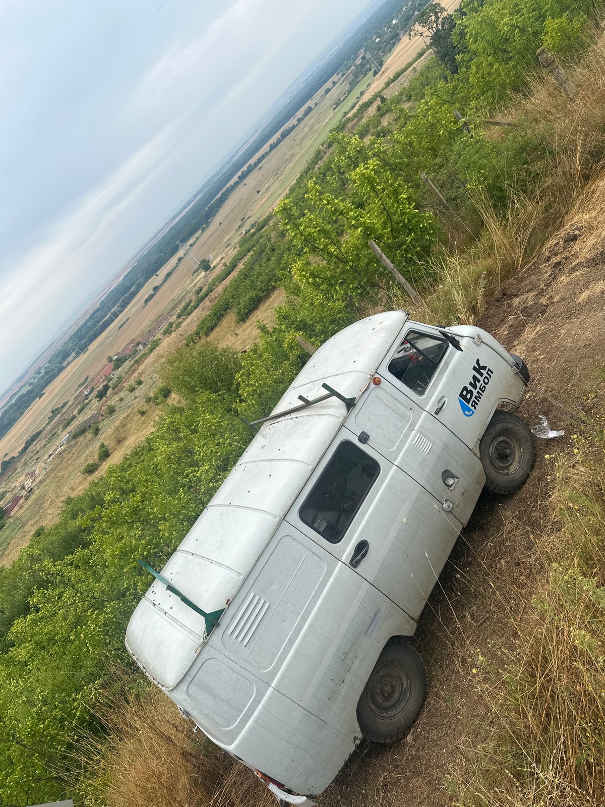 Parked overlooking cultivated fields from a hilltop vantage point