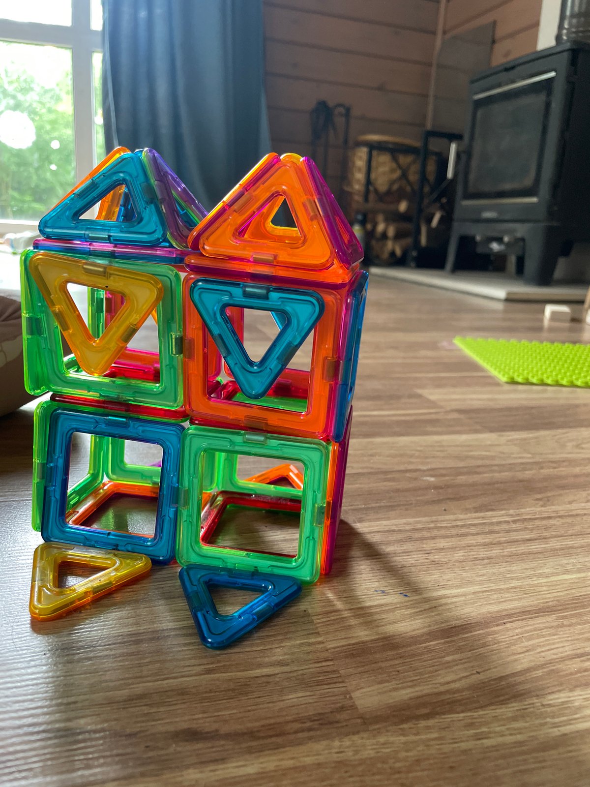 Craft sessions, market goods, and a parked car on a summer day