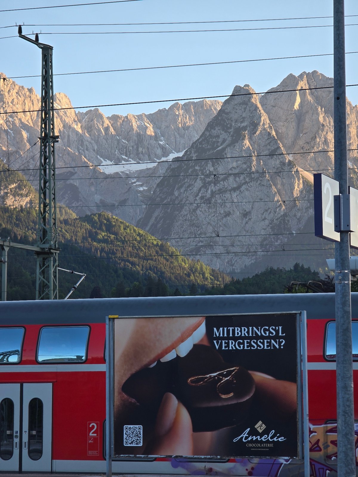 Regional train stop in Garmisch-Partenkirchen with Alpine backdrop