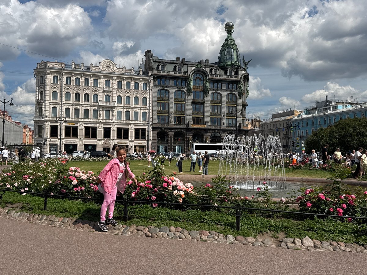 Sunny morning at Singer House and Nevsky Prospekt fountain gardens