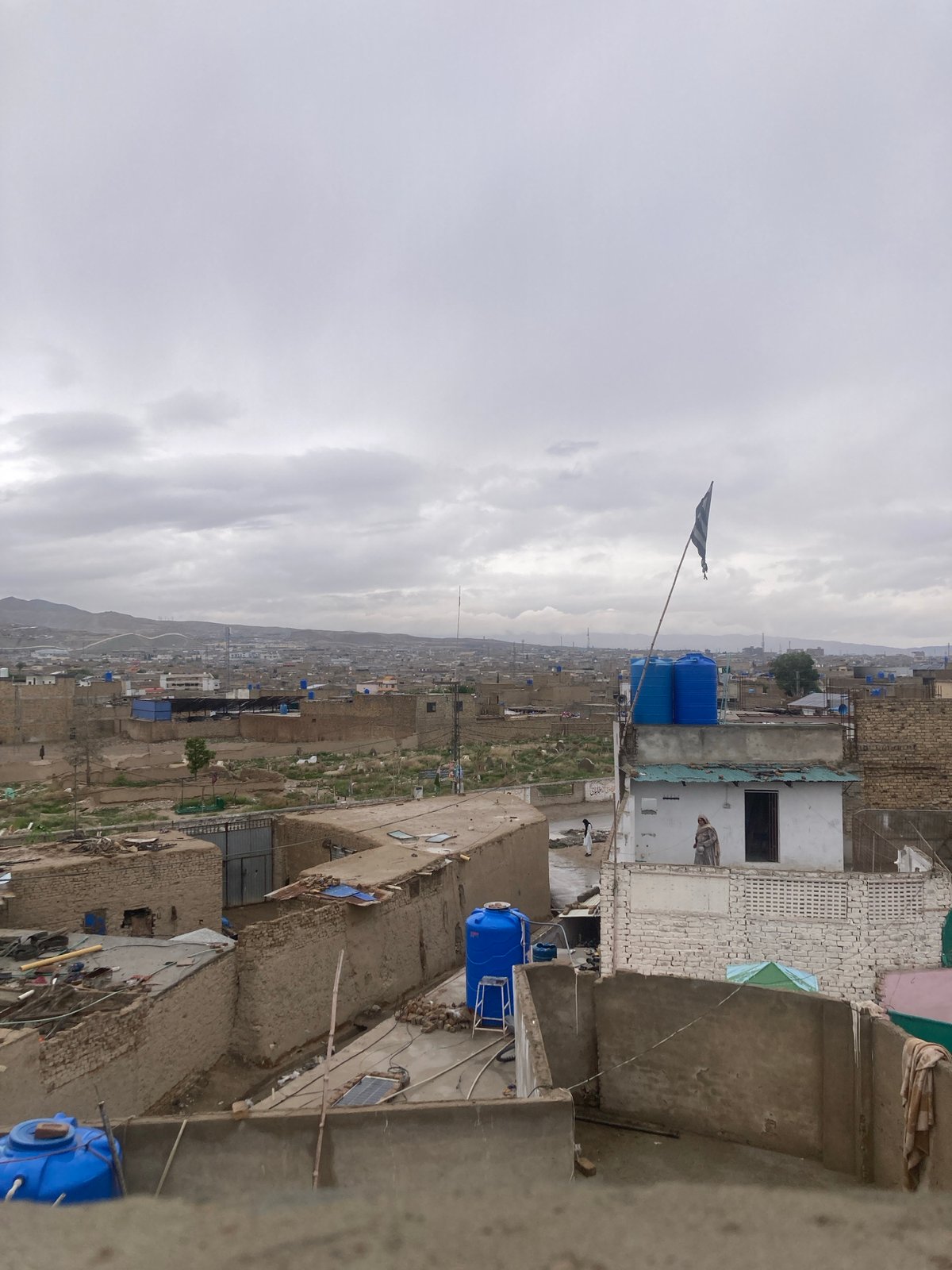 Elevated views capture Quetta cityscape with mountains backdrop