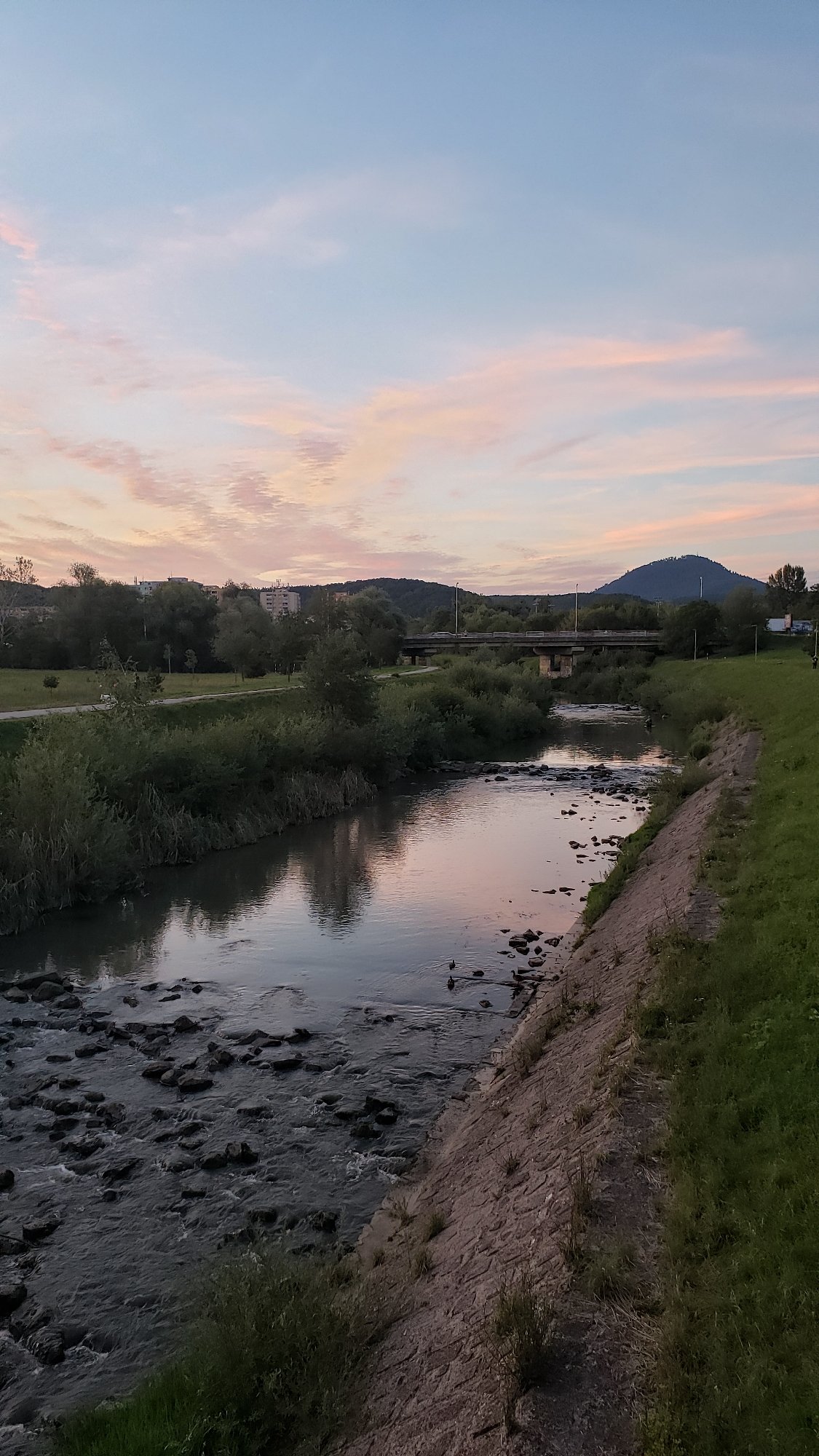 Prešov at dusk: riverside walks, fishing, and a soft summer sky