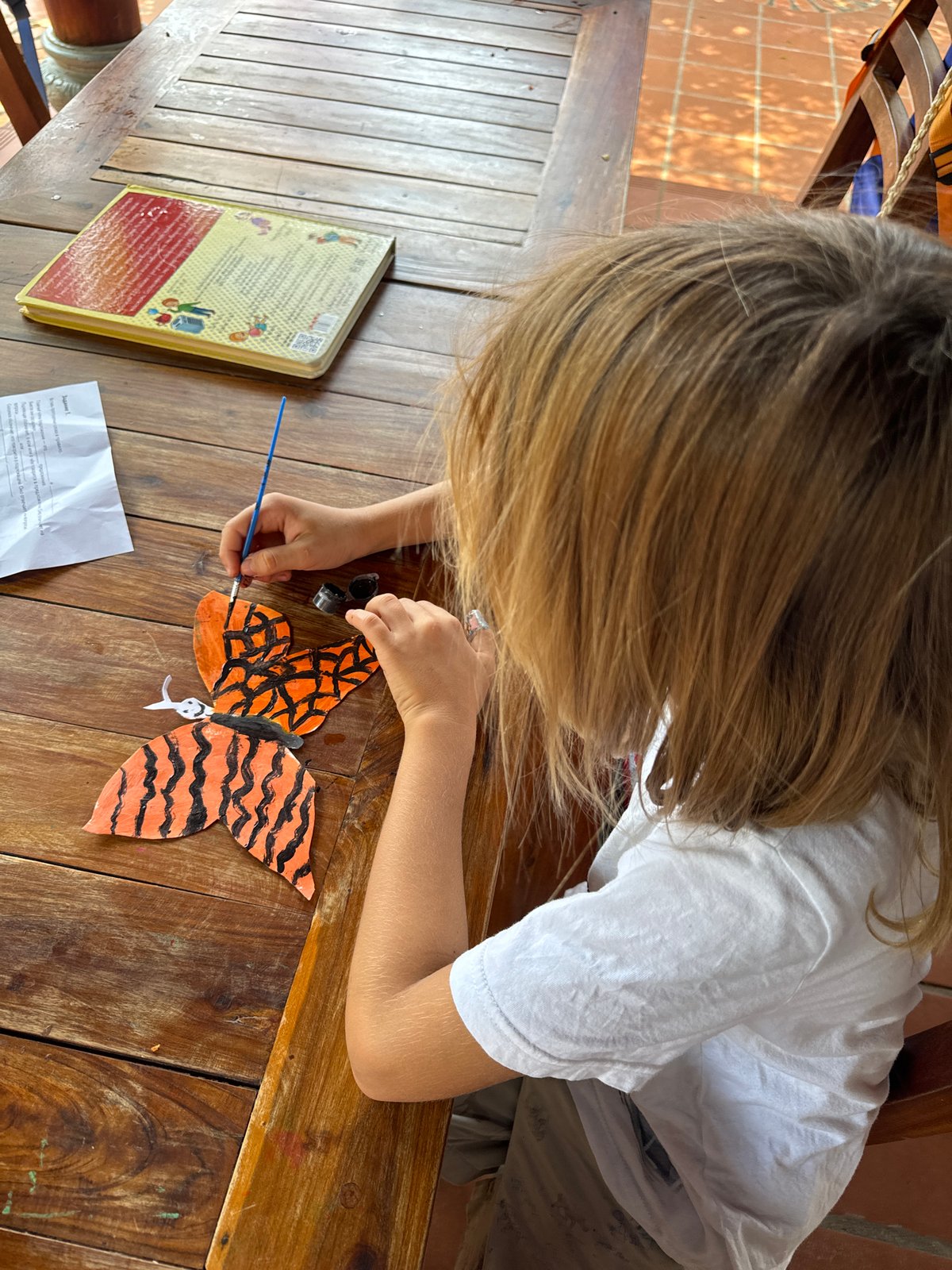 Family celebrates child's birthday with activities in Mũi Né